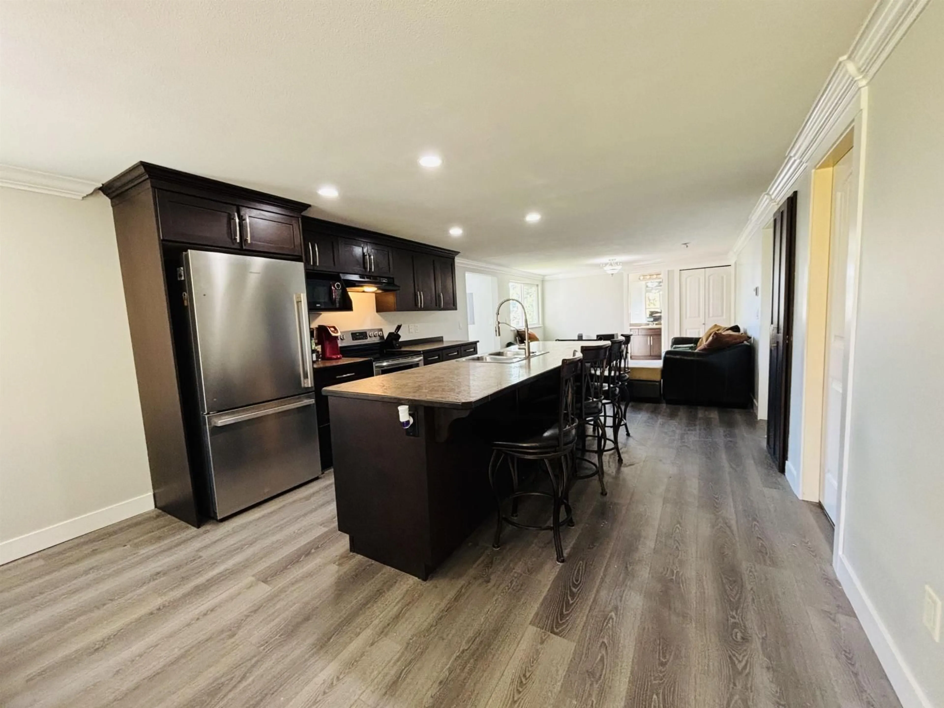 Open concept kitchen, wood/laminate floor for 33475 CHERRY AVENUE, Mission British Columbia V2V2V5