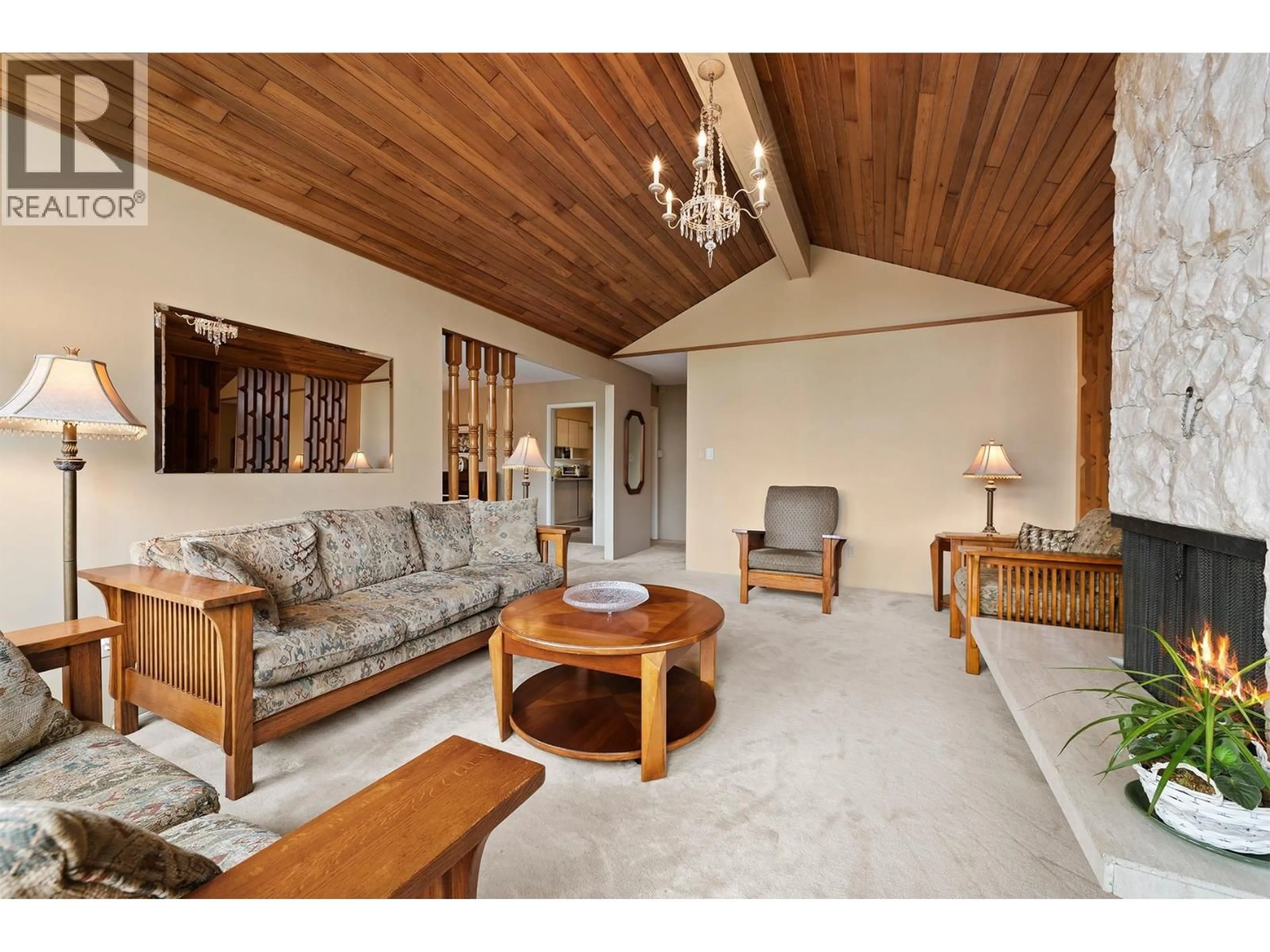 Living room with furniture, wood/laminate floor for 3563 SYKES ROAD, North Vancouver British Columbia V7K2X4