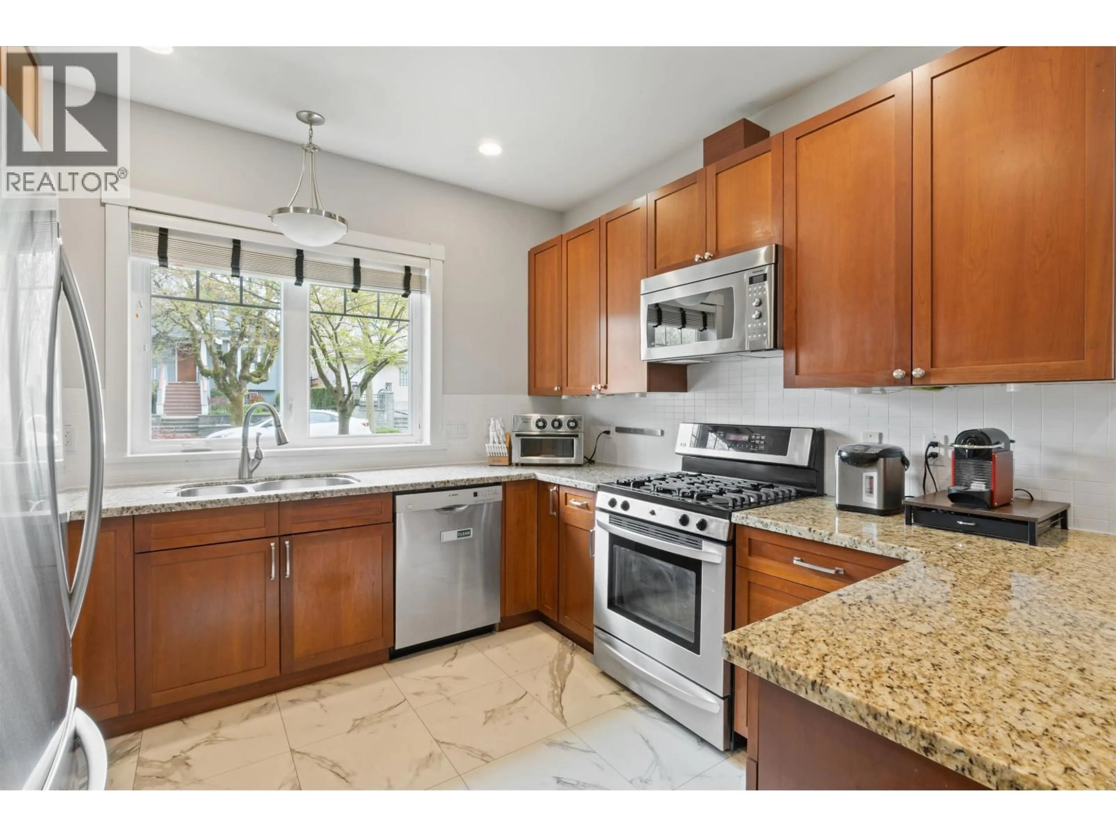Standard kitchen, ceramic/tile floor for 4103 INVERNESS STREET, Vancouver British Columbia V5V5C5
