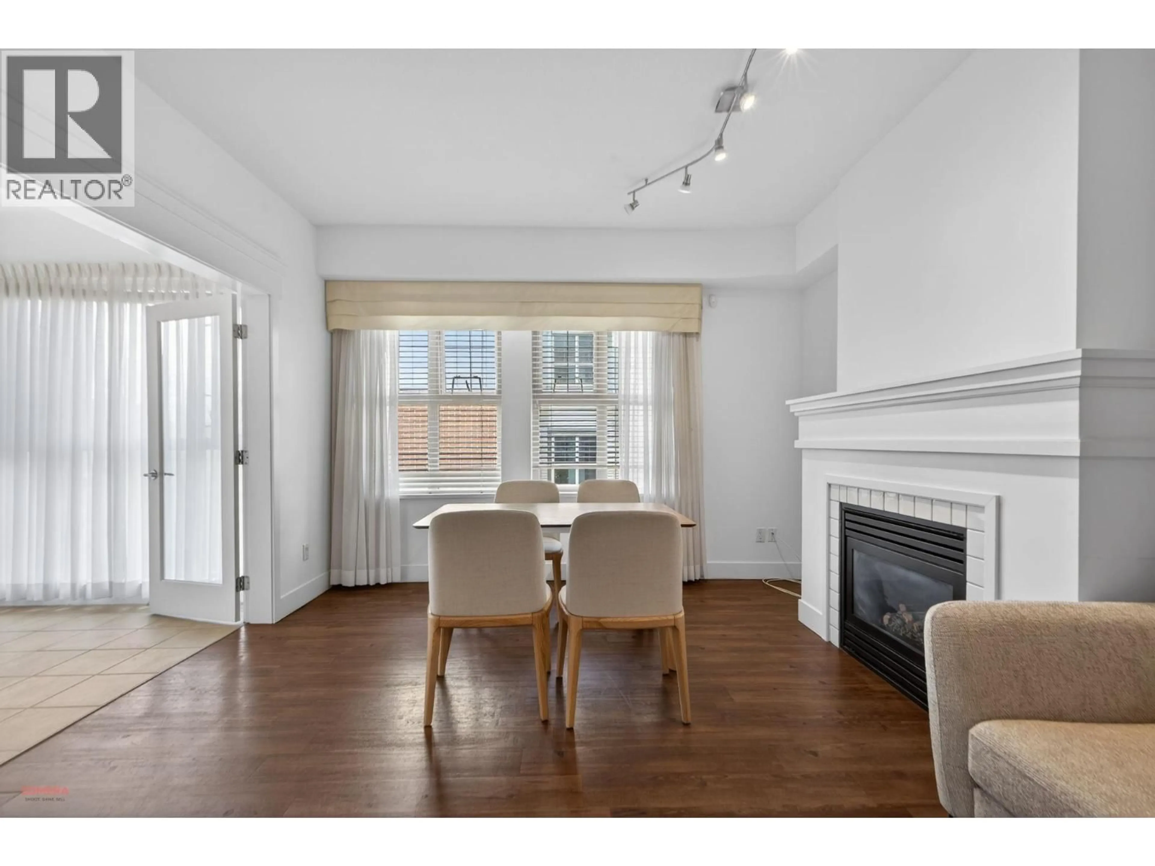 Dining room, wood/laminate floor for 1304 - 4655 VALLEY DRIVE, Vancouver British Columbia V6J5L6