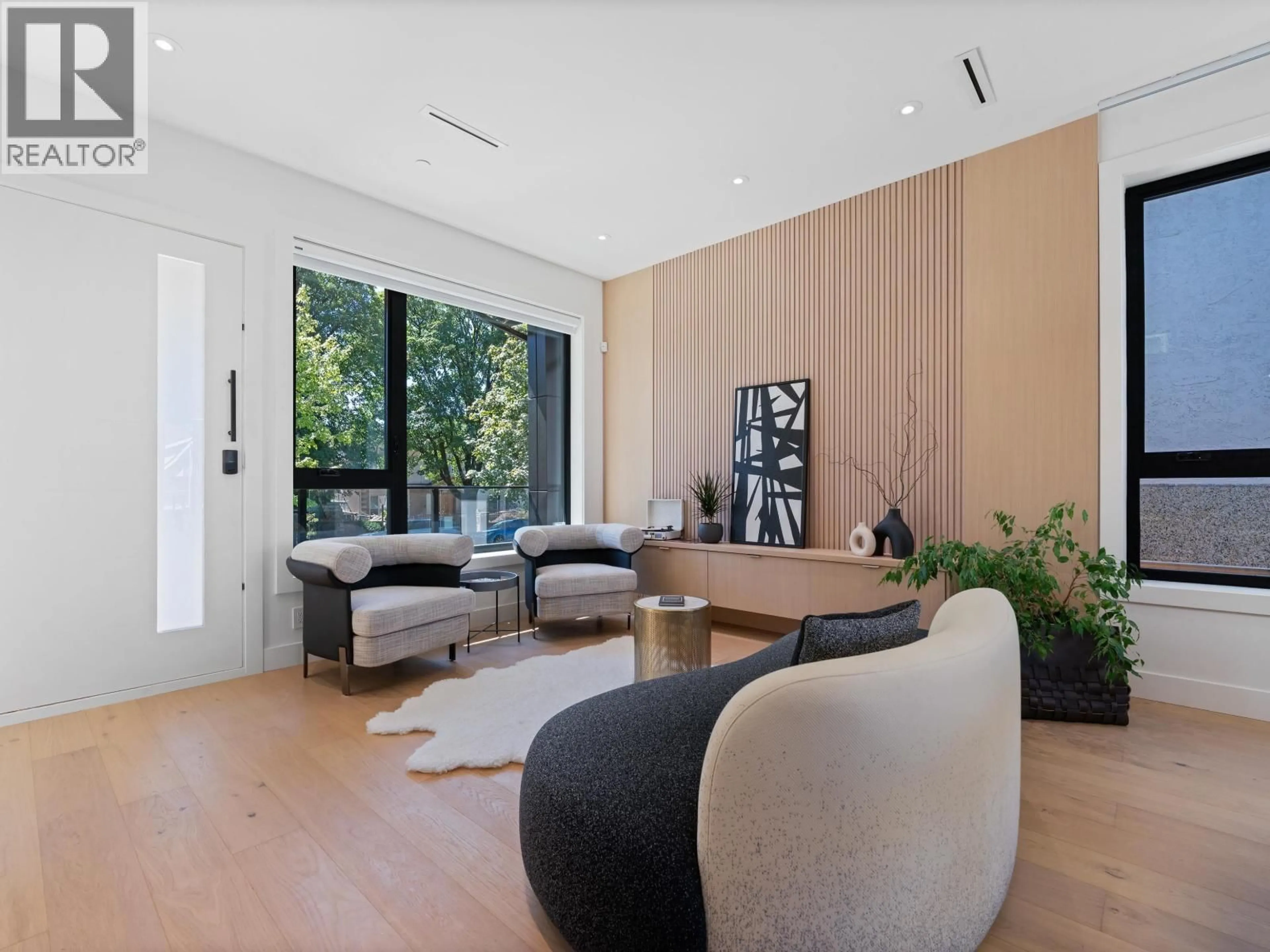 Living room with furniture, wood/laminate floor for 2111 46TH AVENUE, Vancouver British Columbia V5P1P3