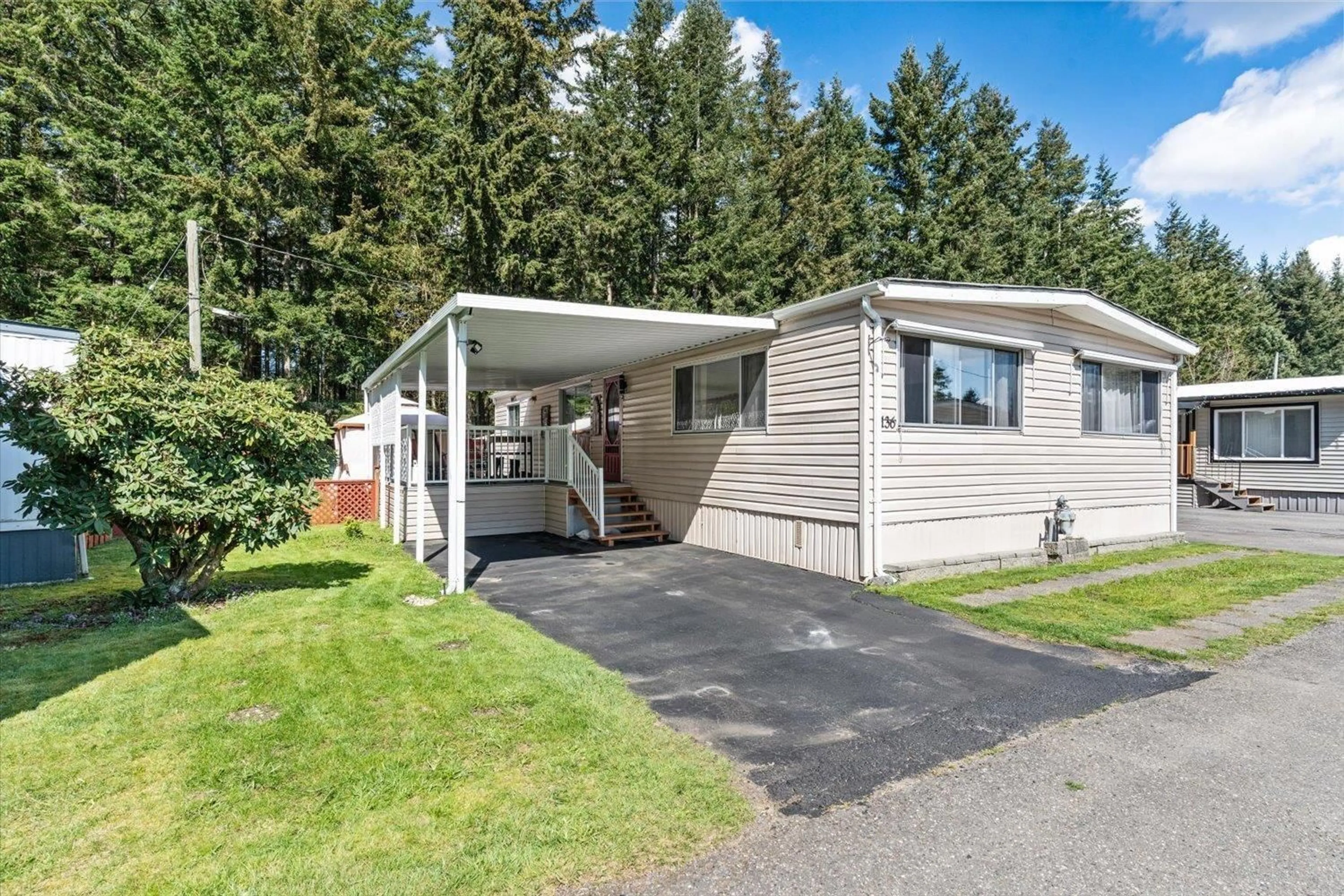 Home with vinyl exterior material, street for 136 - 3031 200 STREET, Langley British Columbia V2Z1N5