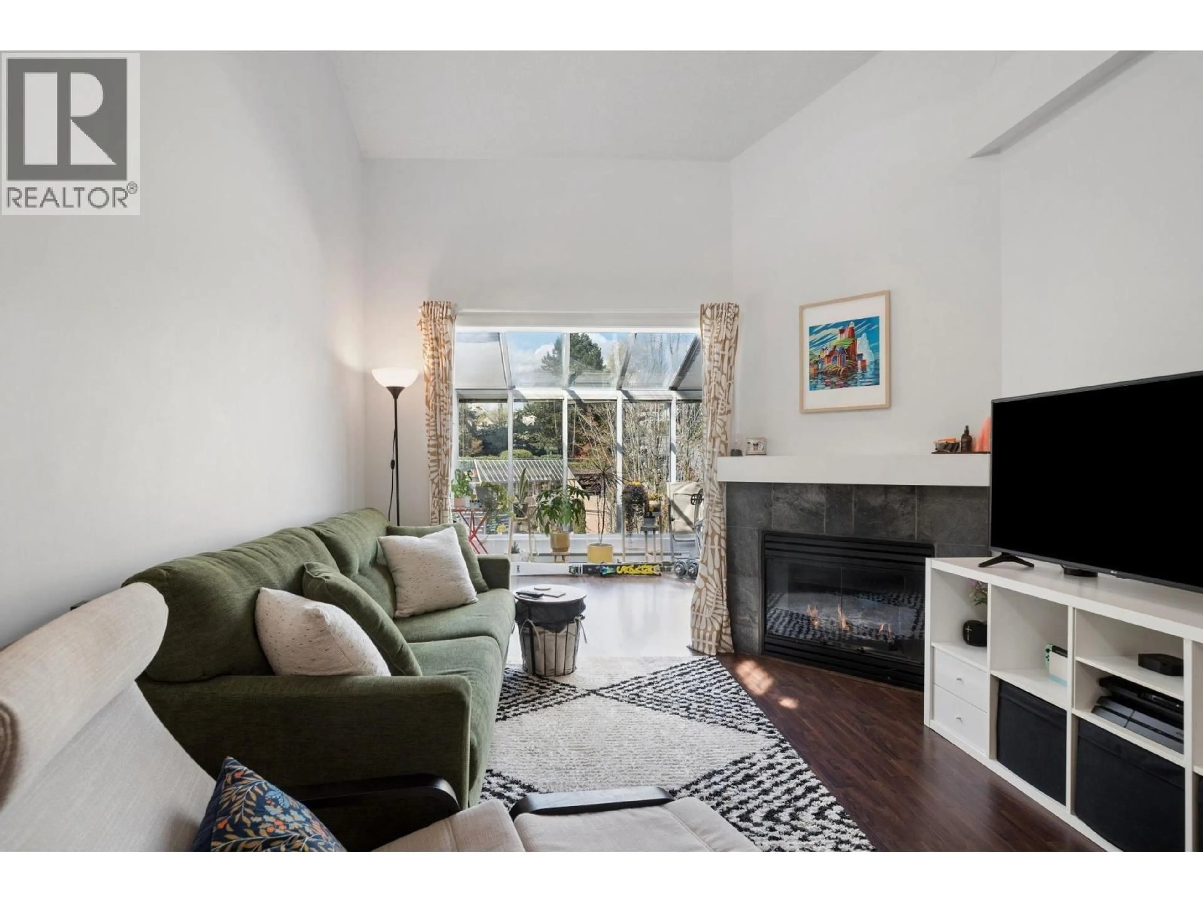 Living room with furniture, unknown for 409 - 3768 HASTINGS STREET, Burnaby British Columbia V5C2H5