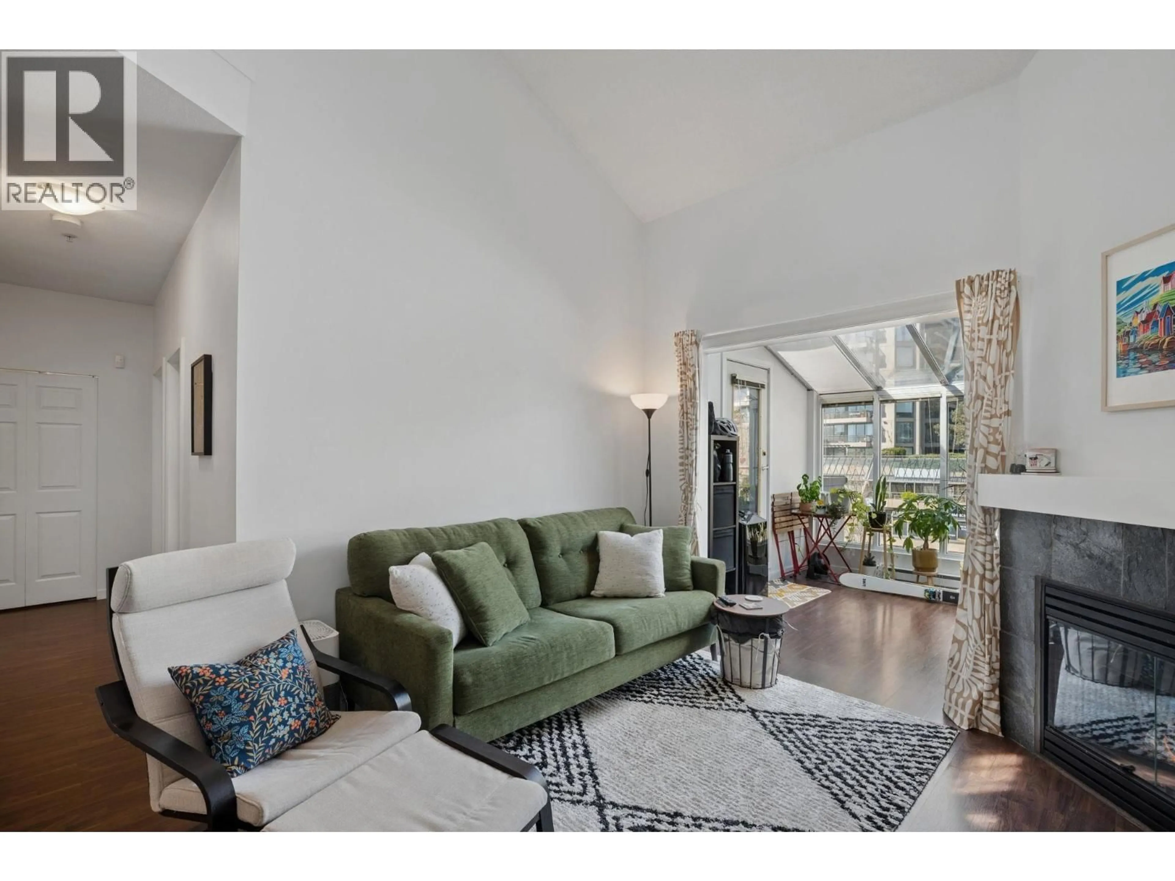 Living room with furniture, unknown for 409 - 3768 HASTINGS STREET, Burnaby British Columbia V5C2H5