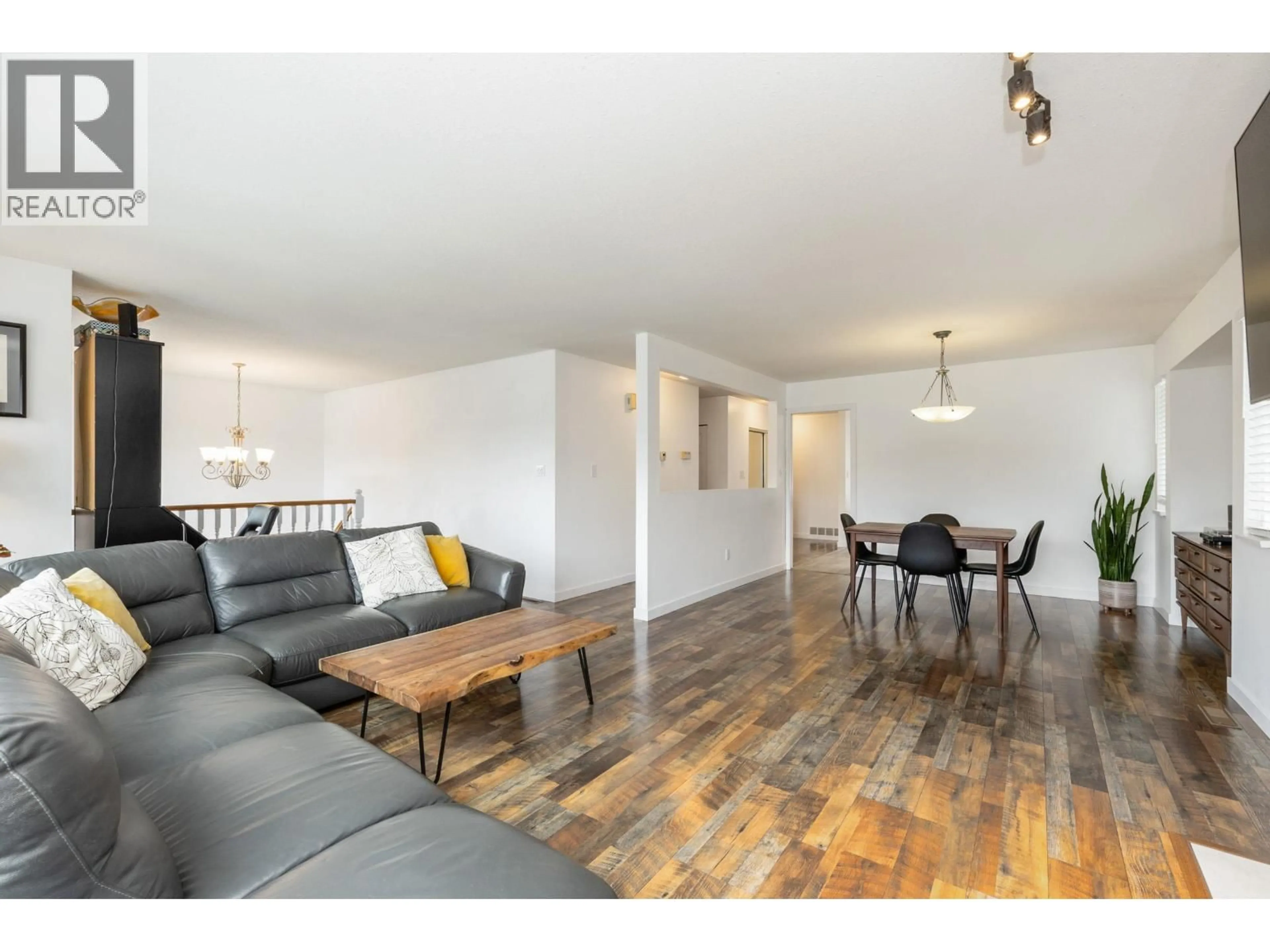 Living room with furniture, wood/laminate floor for 3843 TORONTO STREET, Port Coquitlam British Columbia V3B7J6