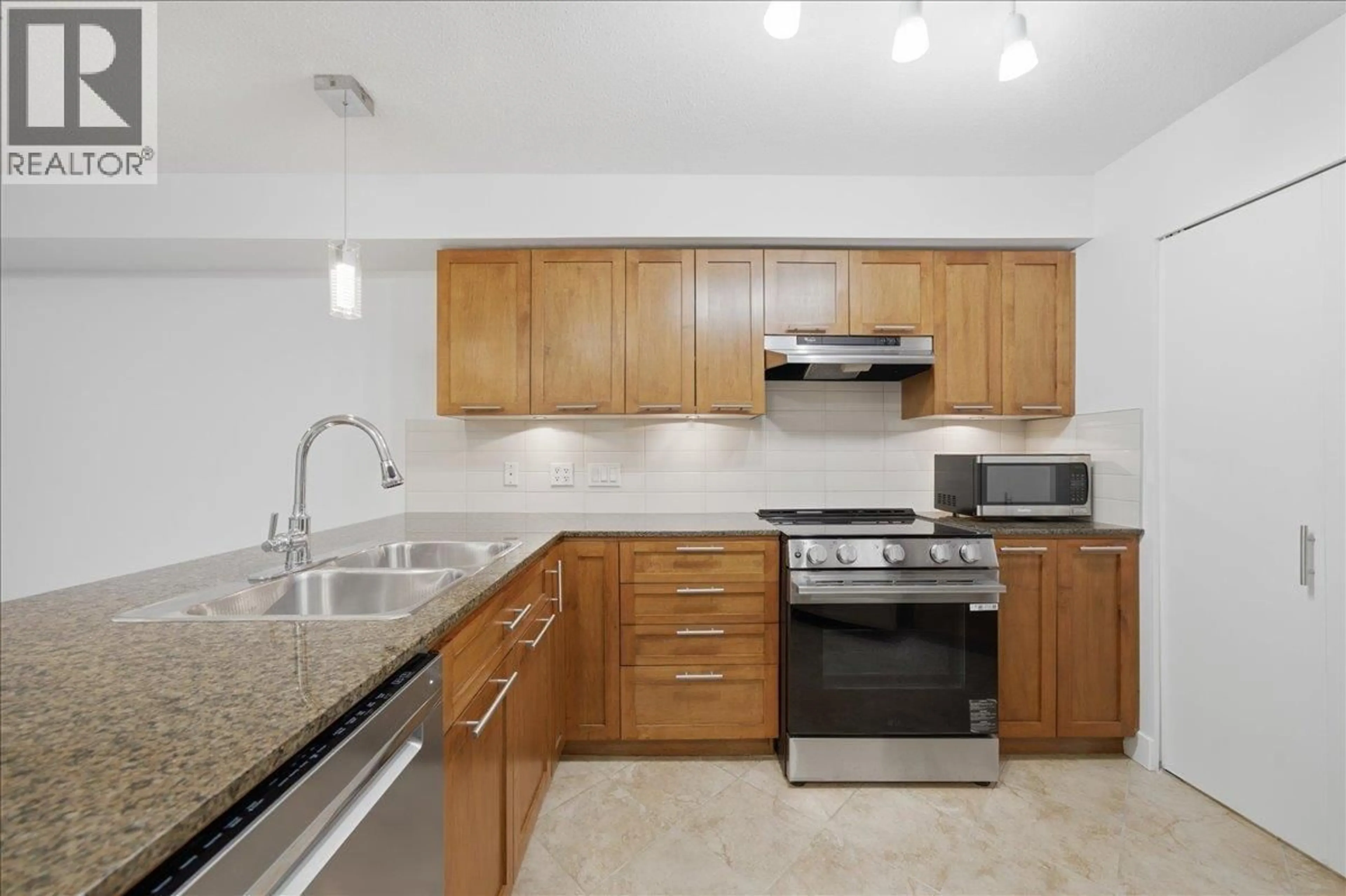 Standard kitchen, ceramic/tile floor for 103 - 19673 MEADOW GARDENS WAY, Pitt Meadows British Columbia V3Y0A1