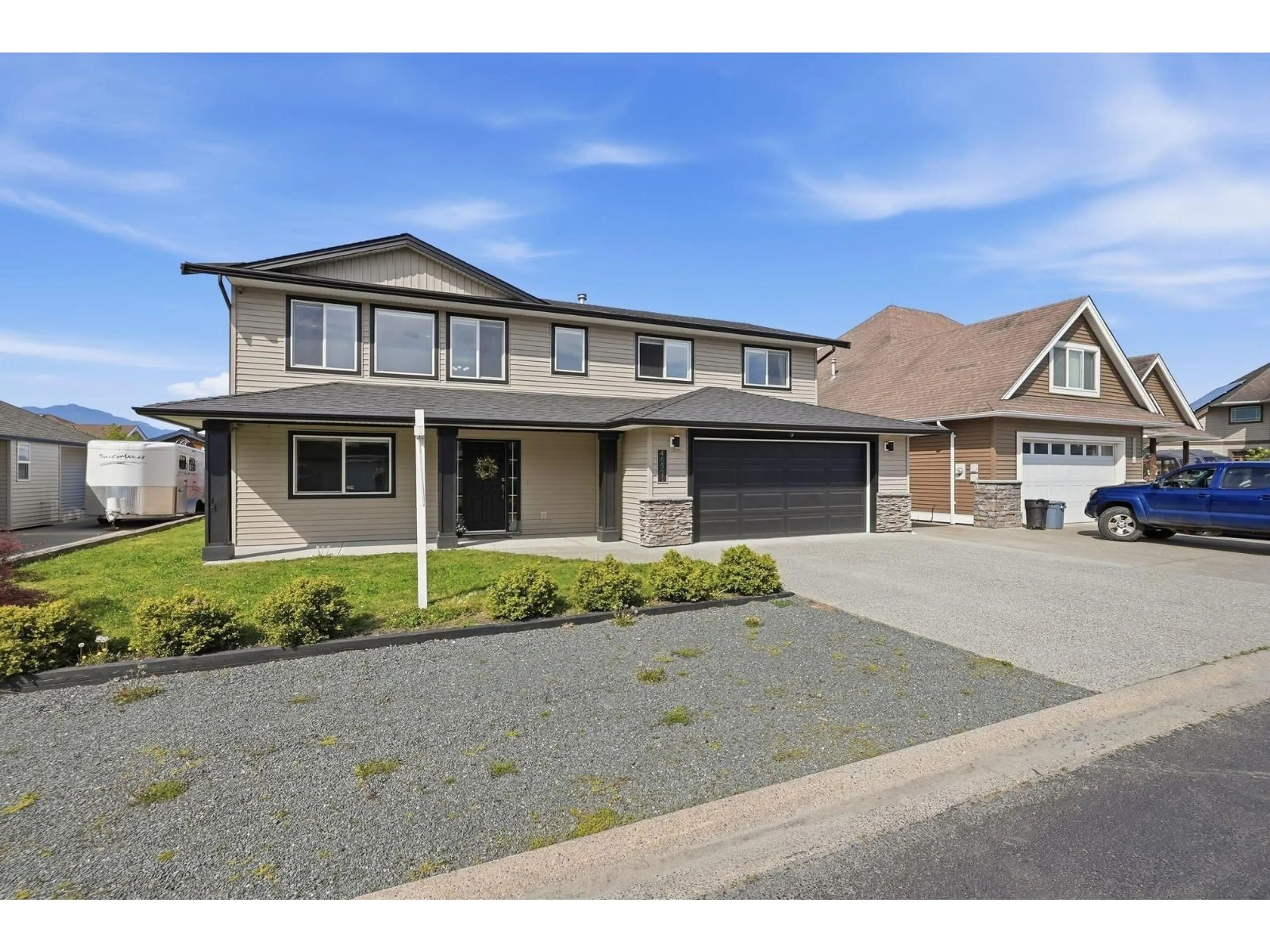 Home with vinyl exterior material, street for 46521 RANCHERO DRIVE, Chilliwack British Columbia V2P5P3
