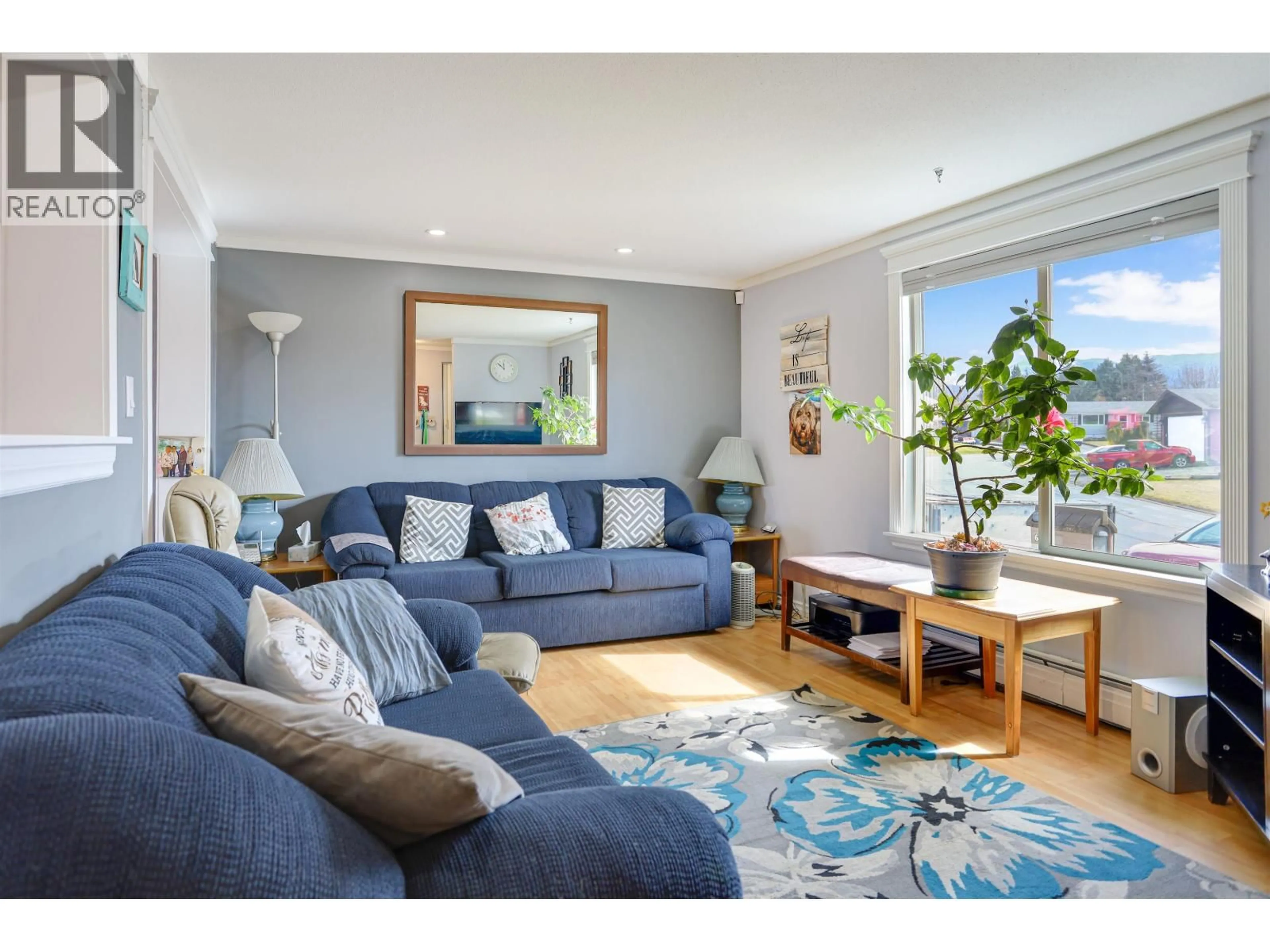 Living room with furniture, wood/laminate floor for 62 CLIFFORD STREET, Kitimat British Columbia V8C1B4