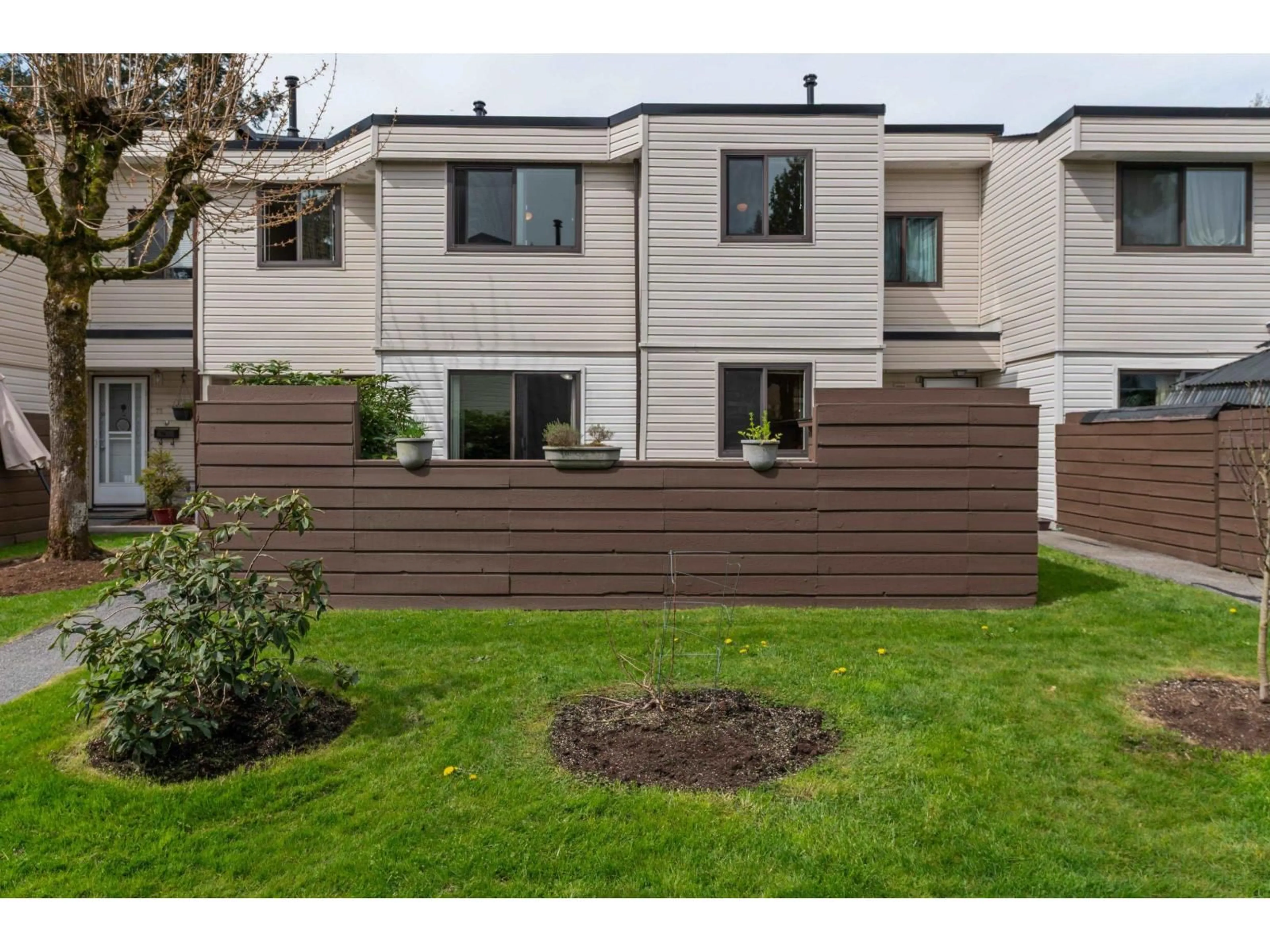 Home with vinyl exterior material, street for 77 - 14129 104 AVENUE, Surrey British Columbia V3T1X6