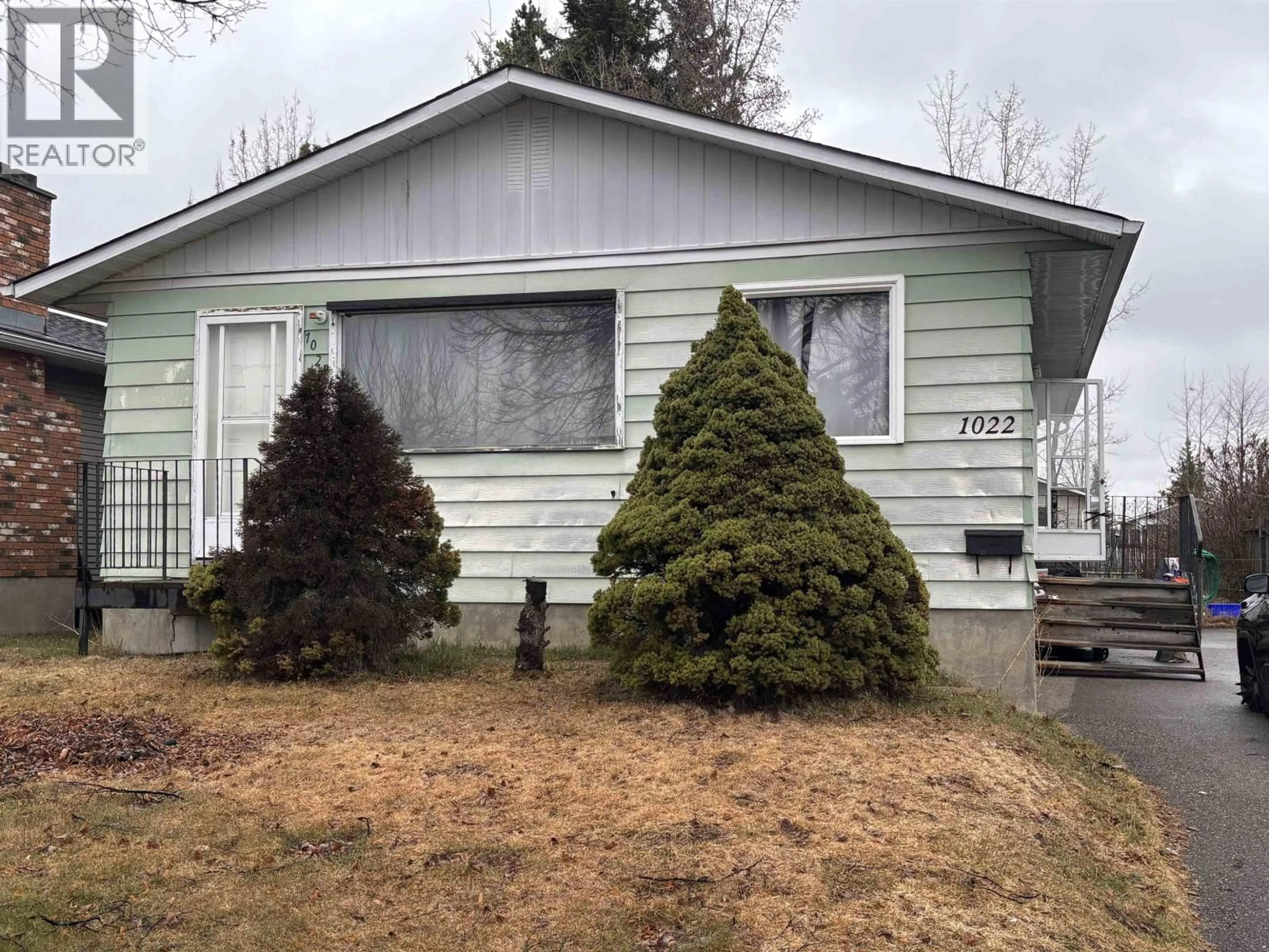 Home with vinyl exterior material, street for 1022 HANSARD CRESCENT, Prince George British Columbia V2M4J9