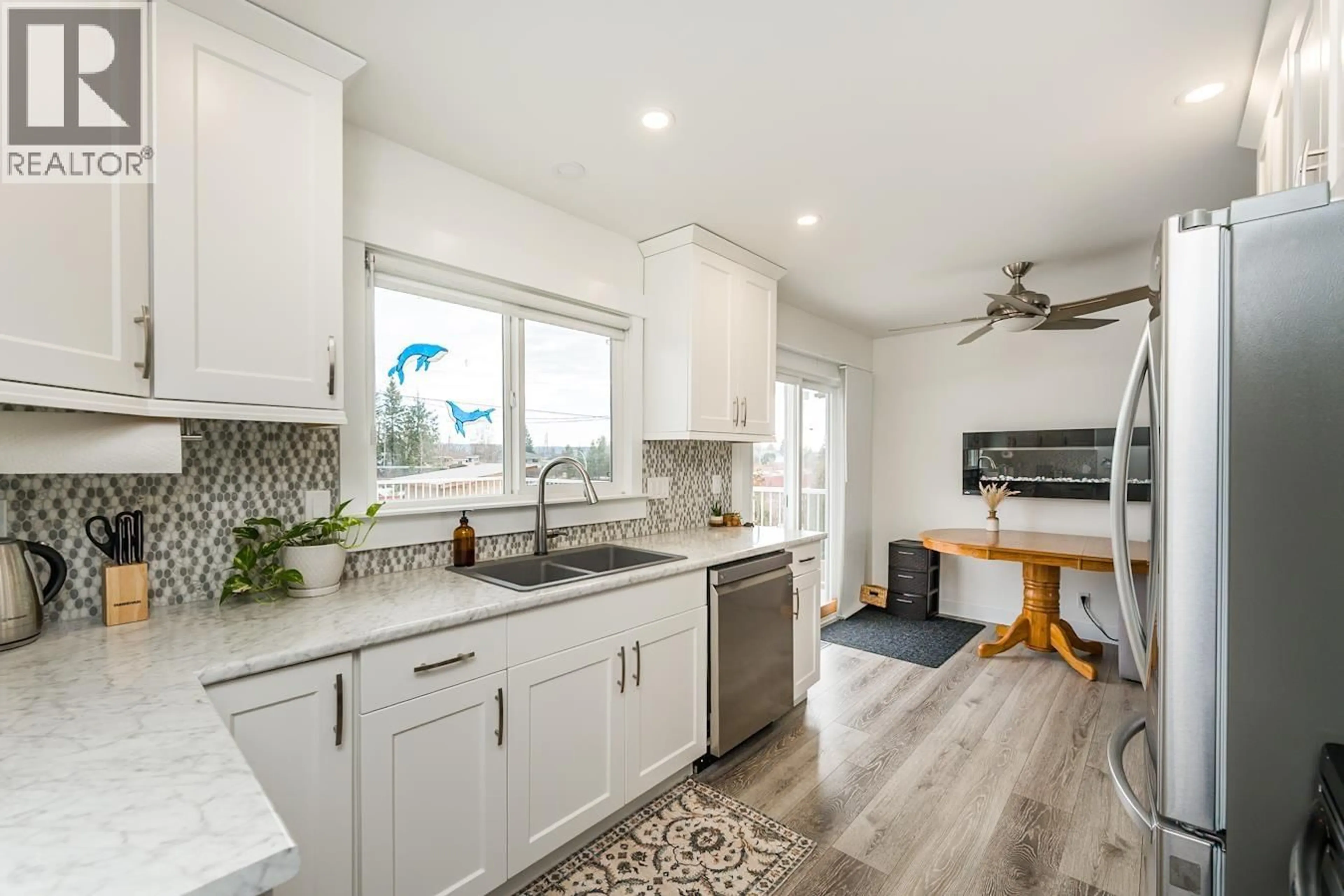 Open concept kitchen, ceramic/tile floor for 138 KELLY STREET, Prince George British Columbia V2M3E4