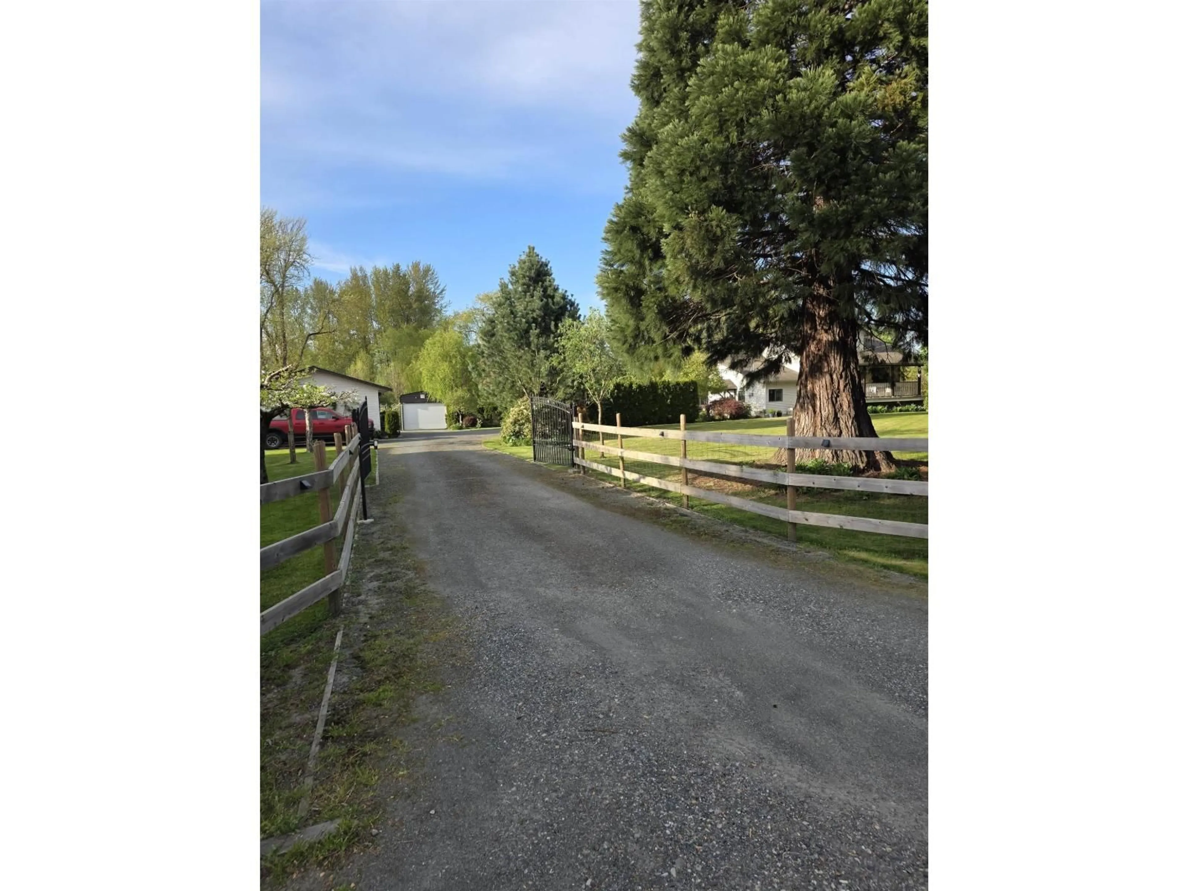A pic from outside/outdoor area/front of a property/back of a property/a pic from drone, street for 44387 SOUTH SUMAS ROAD, Chilliwack British Columbia V2R4B7