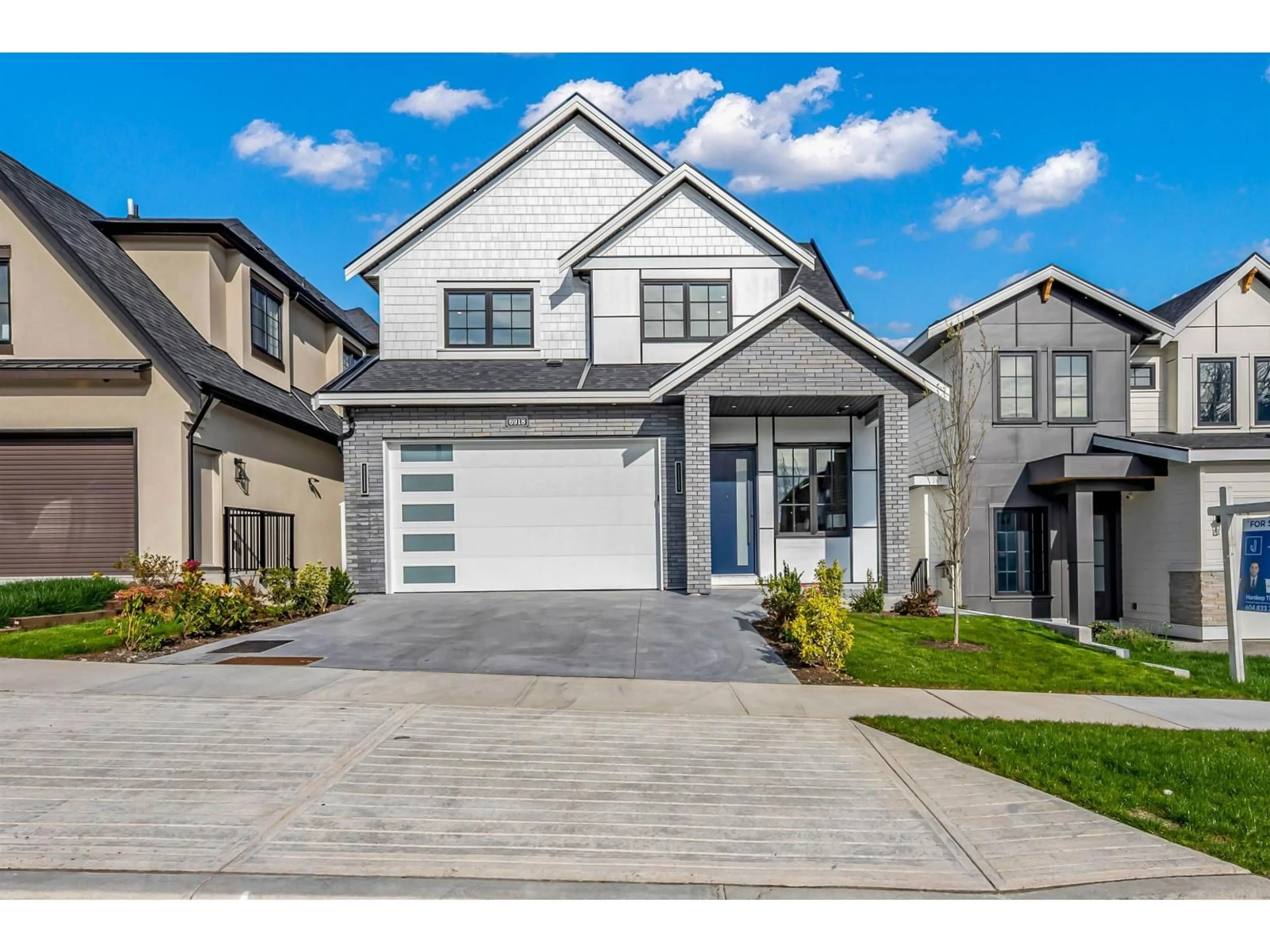 Home with vinyl exterior material, street for 6918 204A STREET, Langley British Columbia V2Y0W4