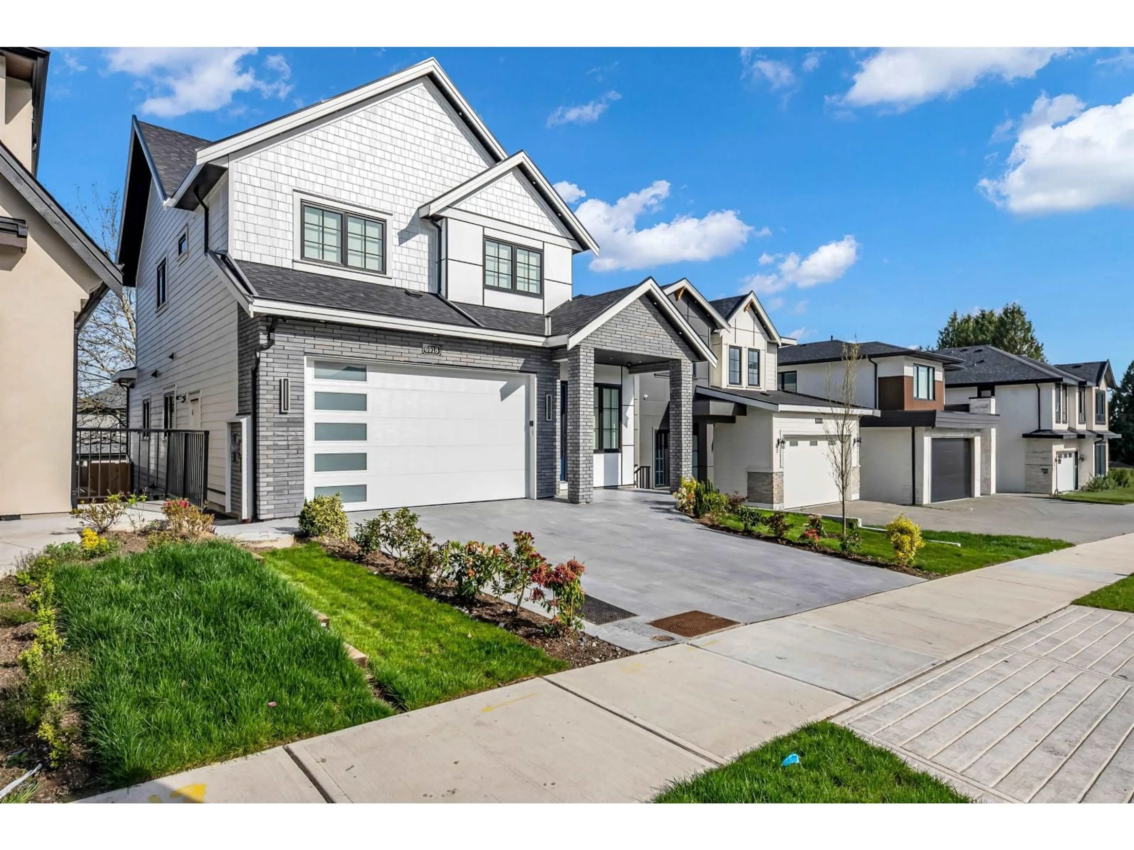 Home with vinyl exterior material, street for 6918 204A STREET, Langley British Columbia V2Y0W4