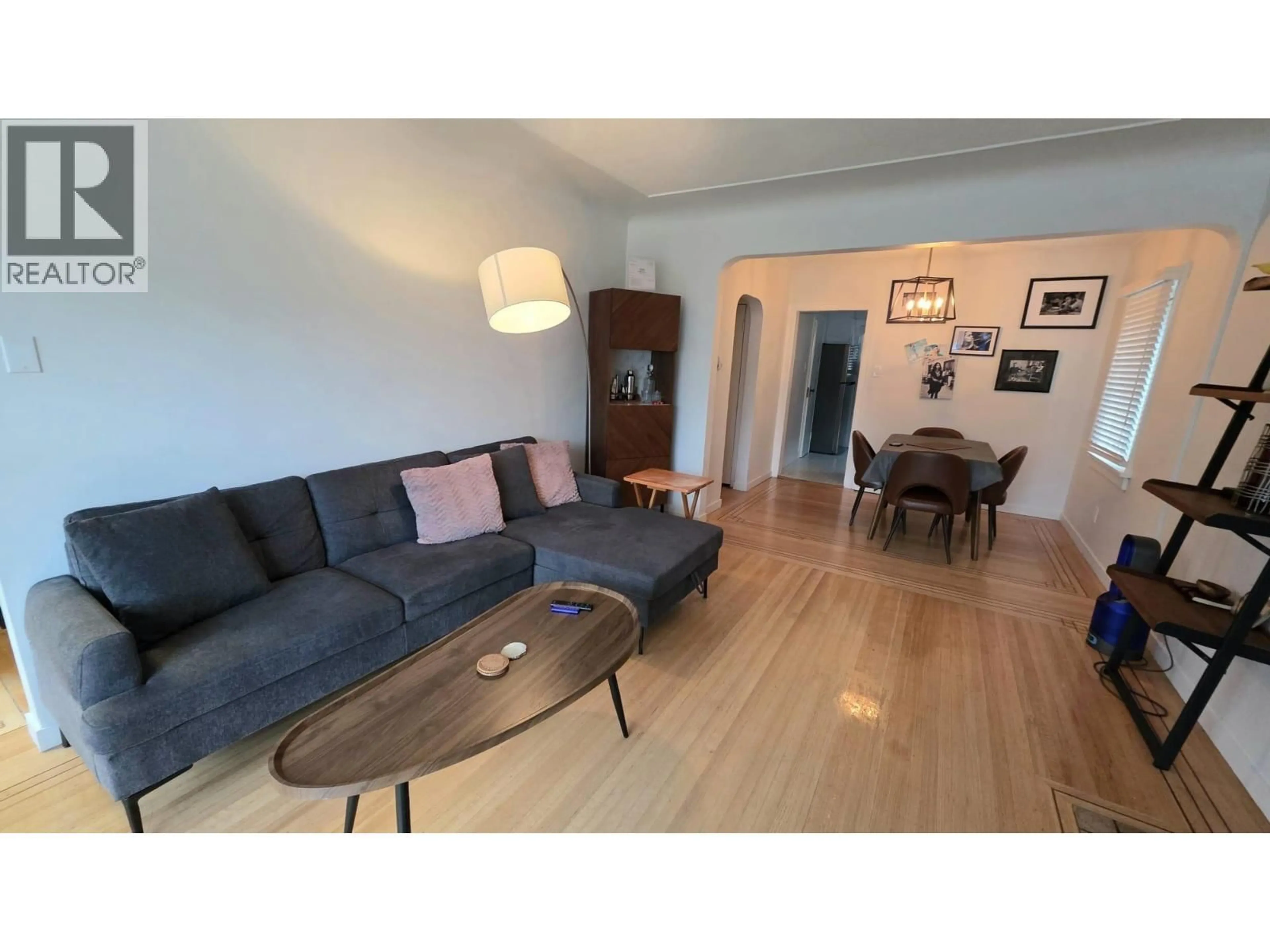 Living room with furniture, wood/laminate floor for 2622 CHARLES STREET, Vancouver British Columbia V5K3A5