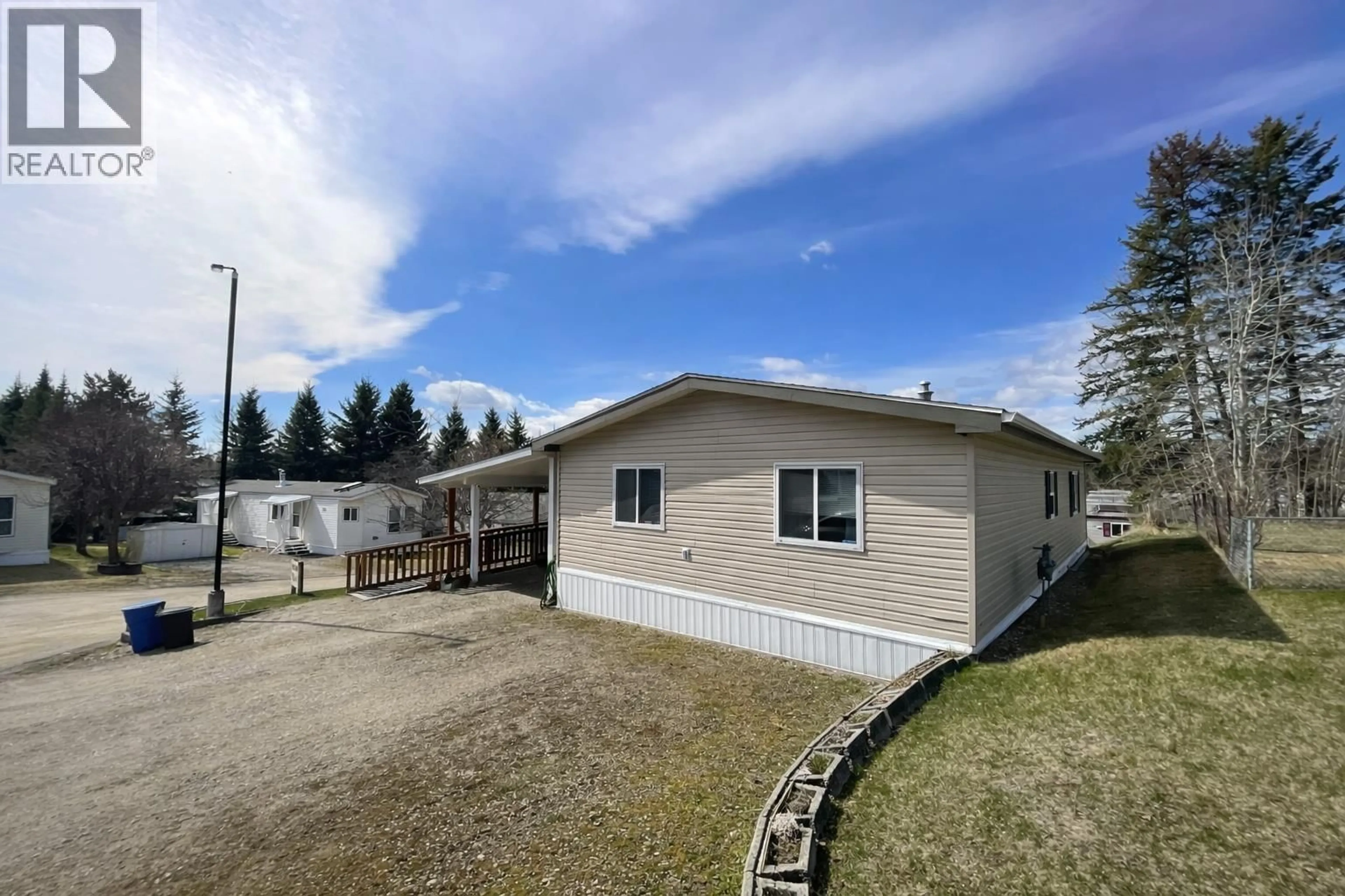 A pic from outside/outdoor area/front of a property/back of a property/a pic from drone, street for 21 - 370 WESTLAND ROAD, Quesnel British Columbia V2J6A7