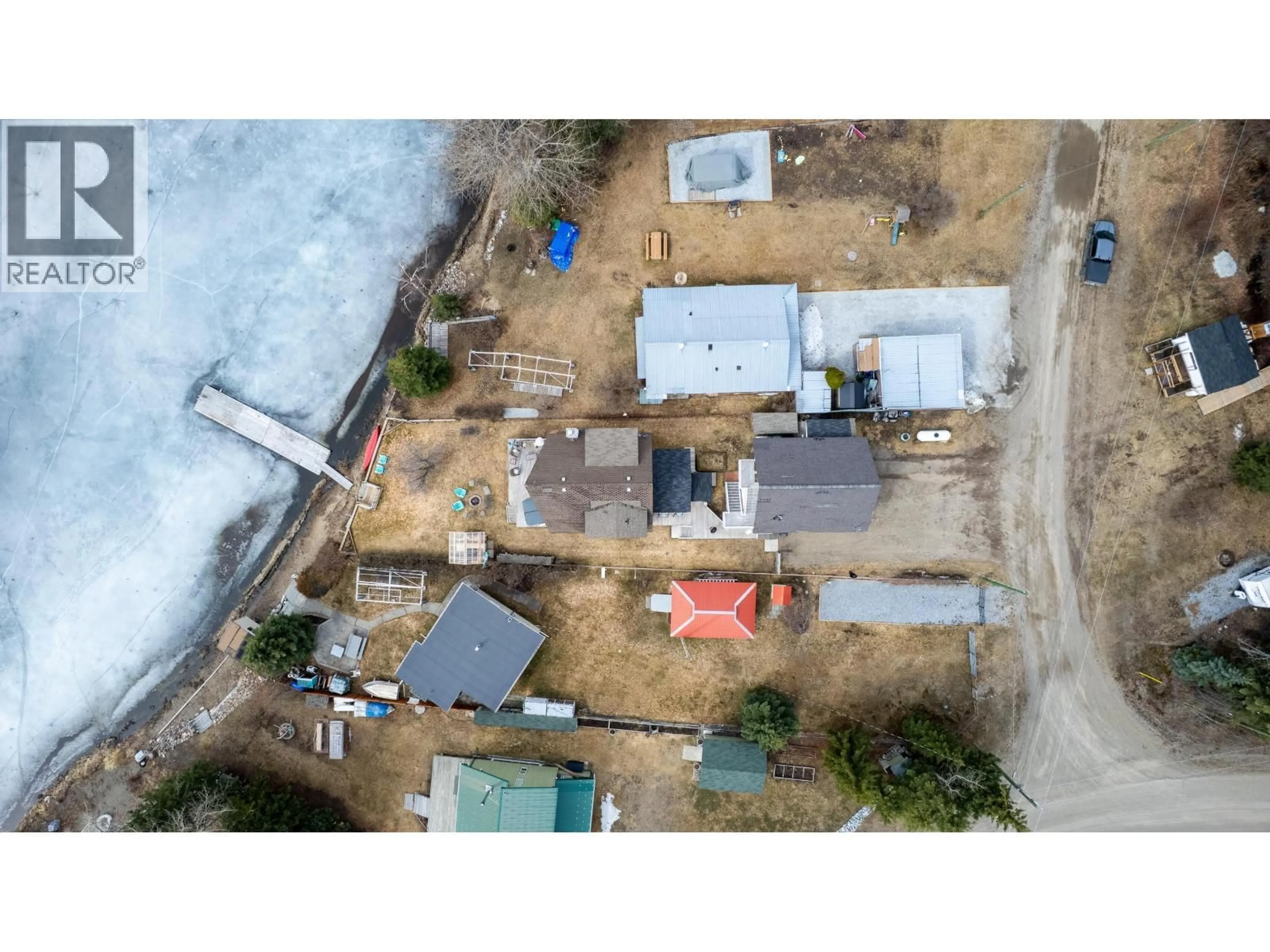 A pic from outside/outdoor area/front of a property/back of a property/a pic from drone, street for 50465 LAKES ROAD, Cluculz Lake British Columbia V0J3A3