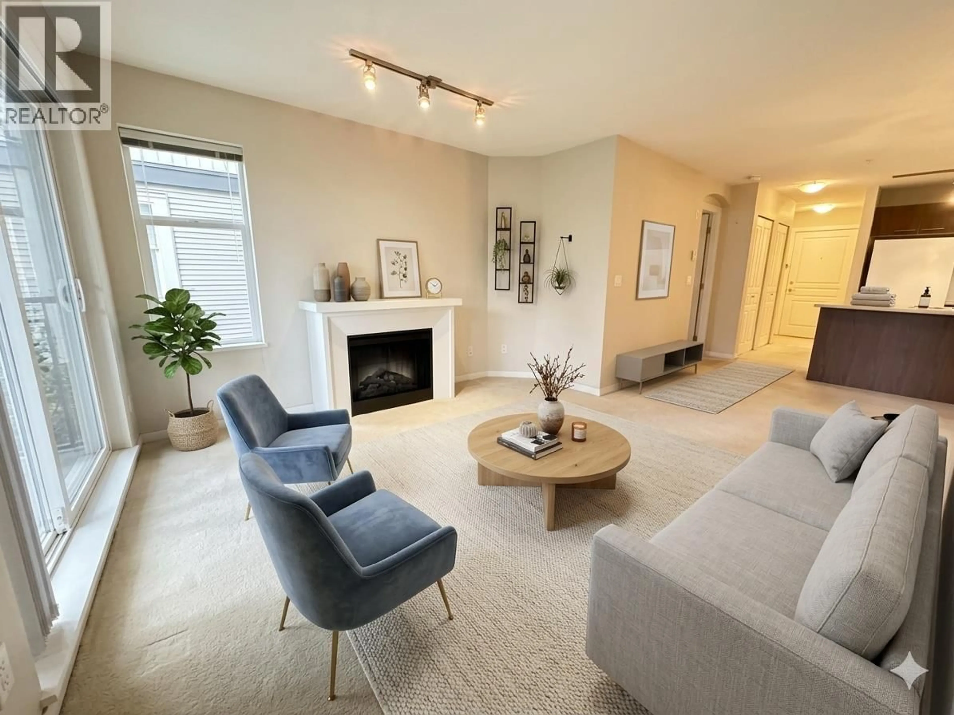 Living room with furniture, unknown for 313 - 4833 BRENTWOOD DRIVE, Burnaby British Columbia V5C0C3