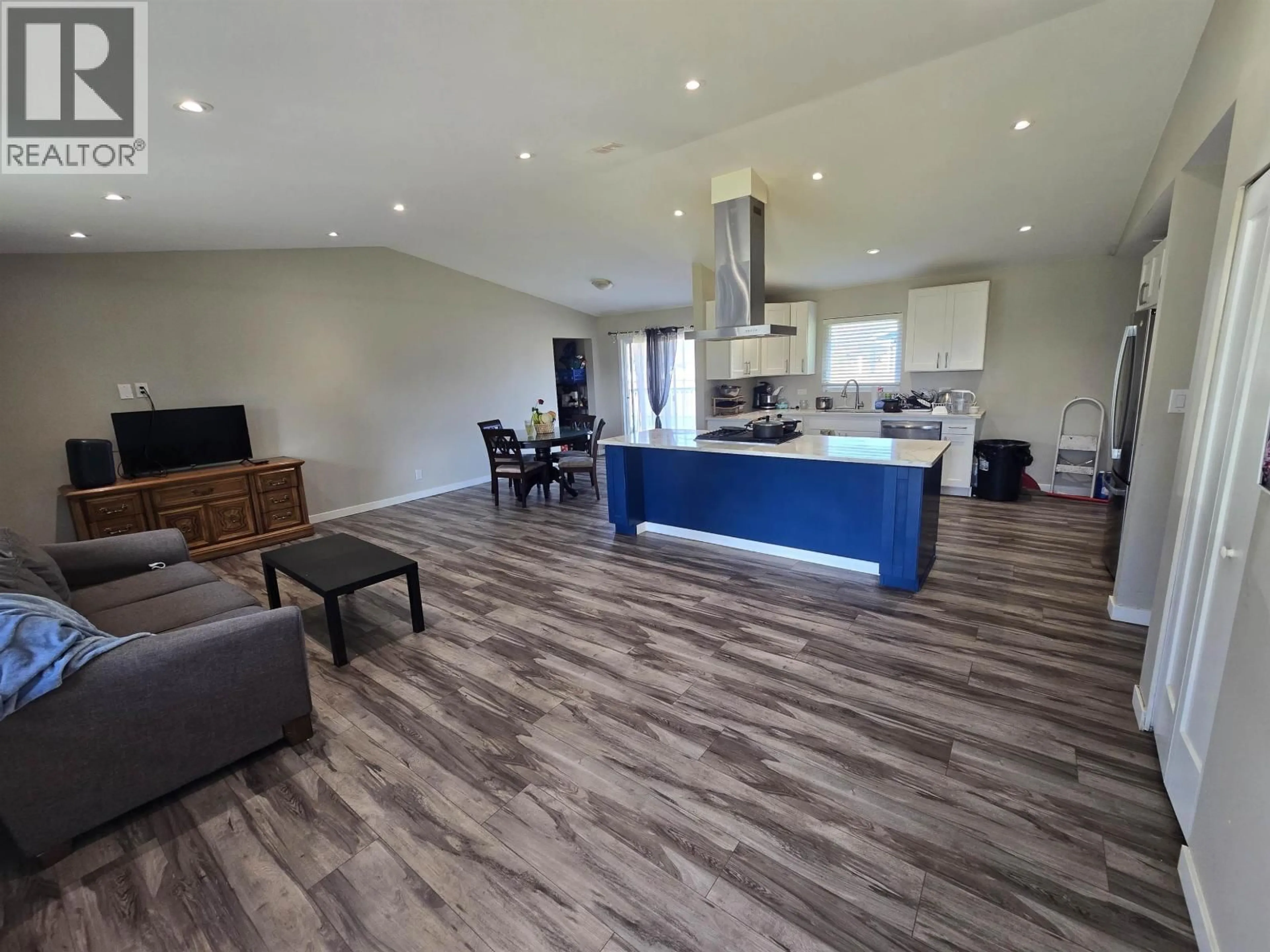 Open concept kitchen, wood/laminate floor for 4930 WALSH AVENUE, Terrace British Columbia V8G1Z2