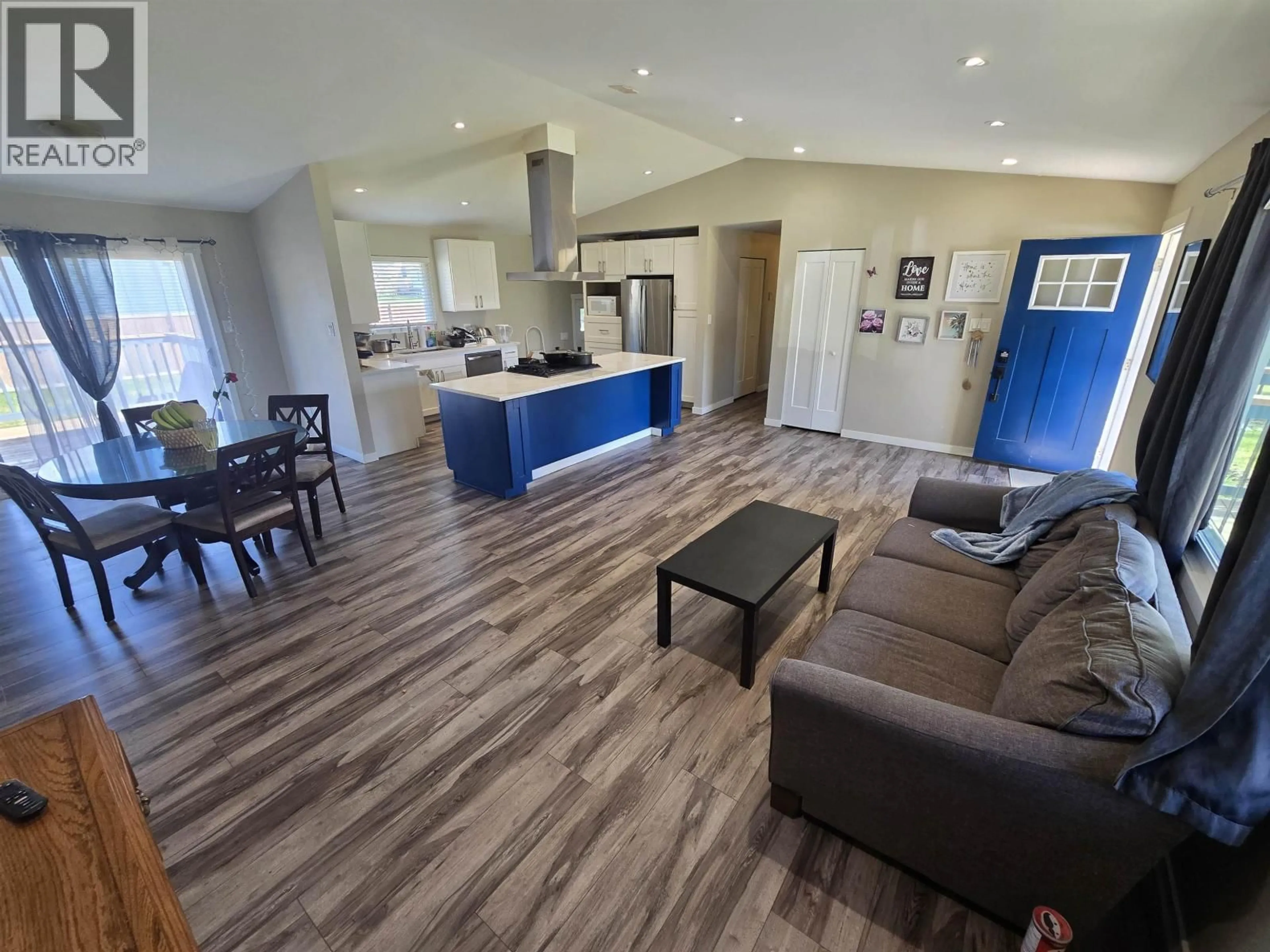 Open concept kitchen, wood/laminate floor for 4930 WALSH AVENUE, Terrace British Columbia V8G1Z2