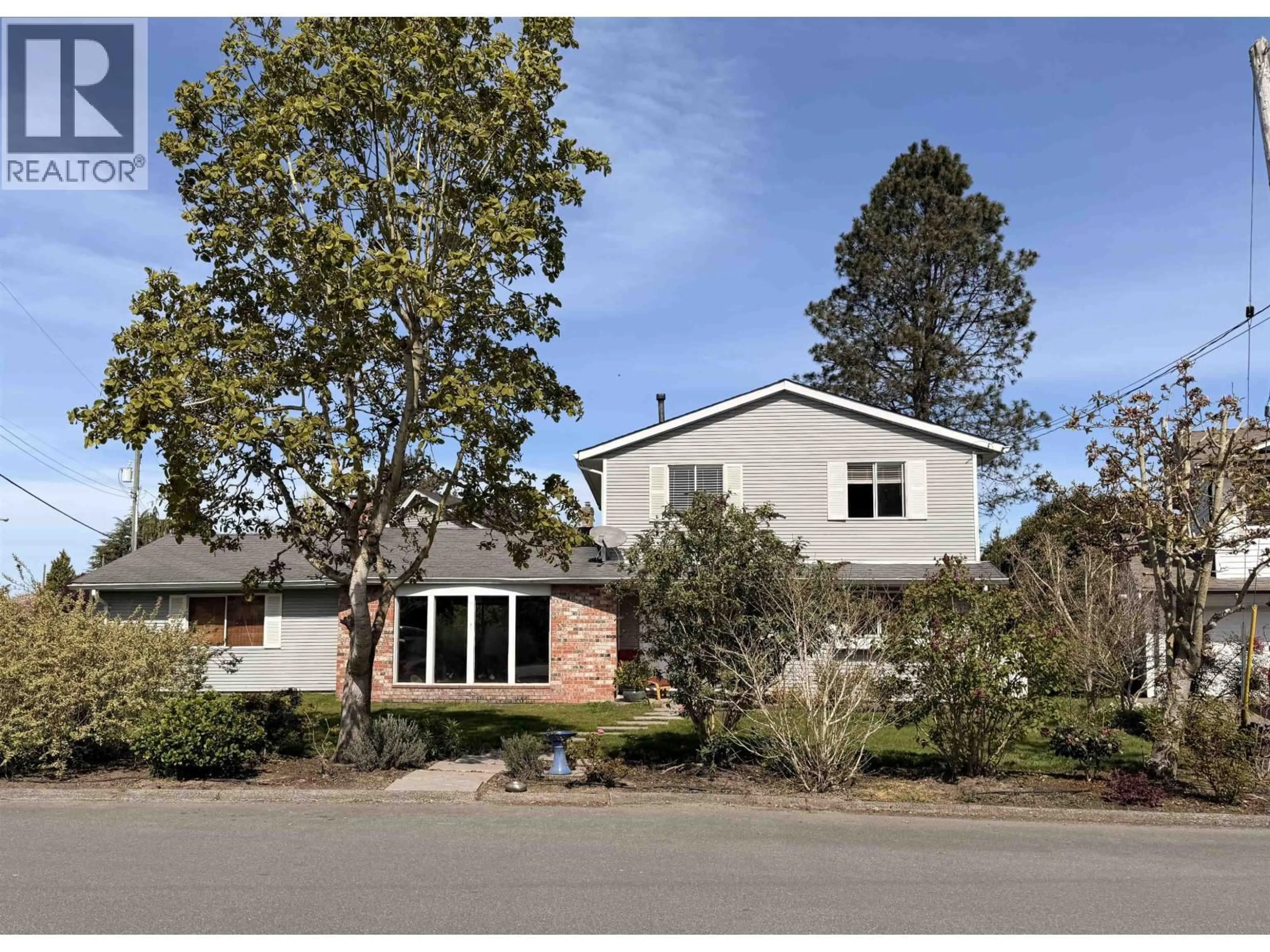 Home with brick exterior material, street for 5463 50 AVENUE, Ladner British Columbia V4K2A1