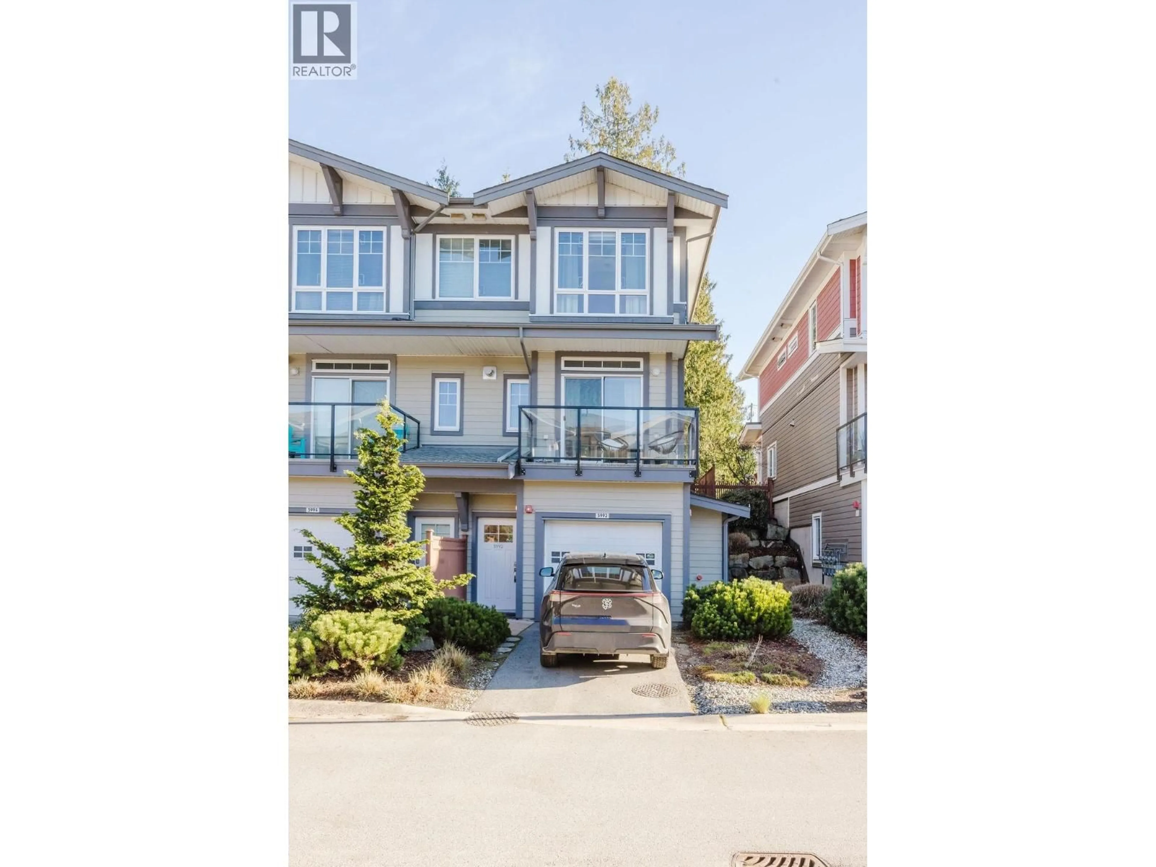 A pic from outside/outdoor area/front of a property/back of a property/a pic from drone, street for 5992 OLDMILL LANE, Sechelt British Columbia V7Z0S2