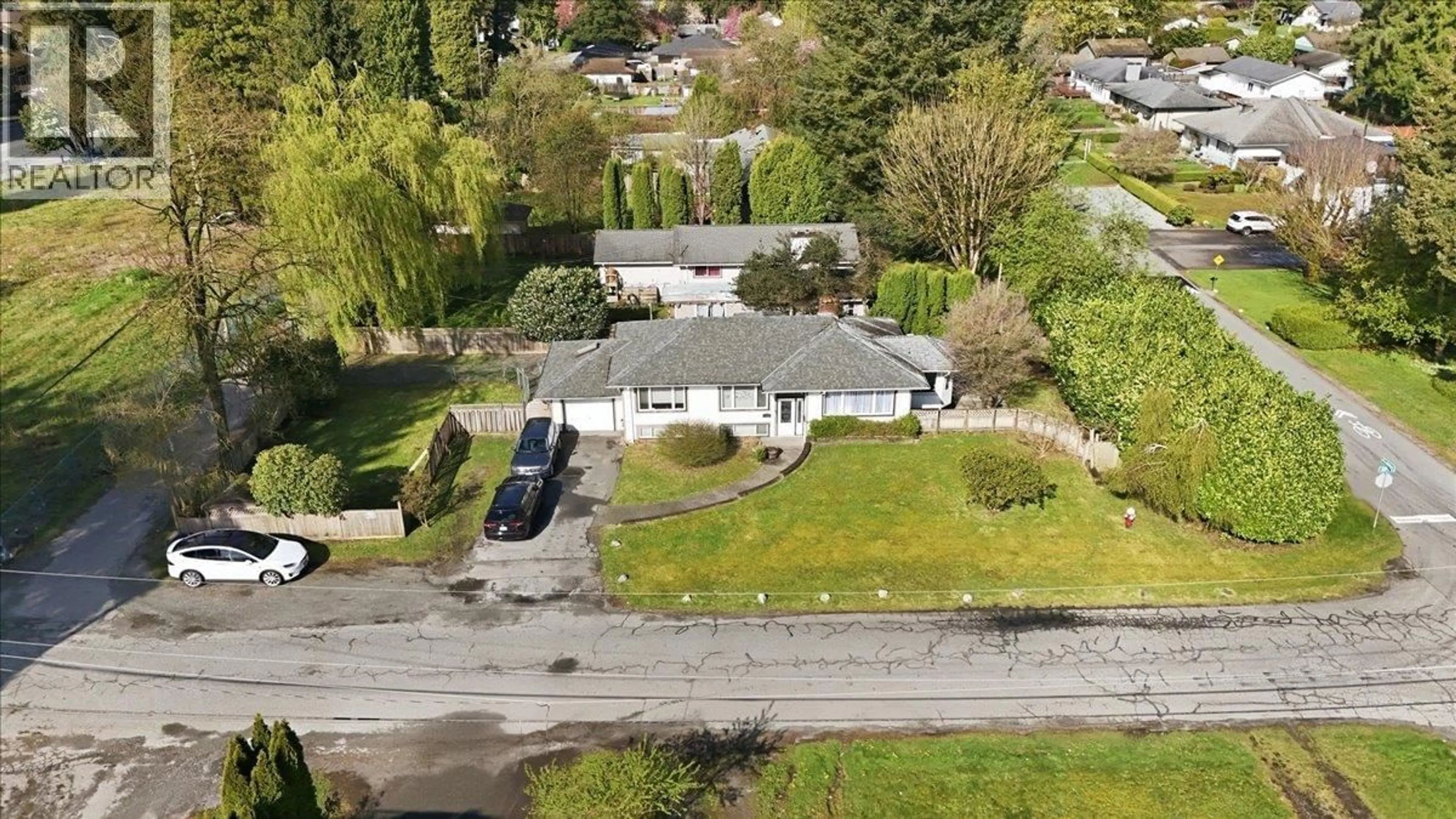 A pic from outside/outdoor area/front of a property/back of a property/a pic from drone, street for 11851 221 STREET, Maple Ridge British Columbia V2X5S4