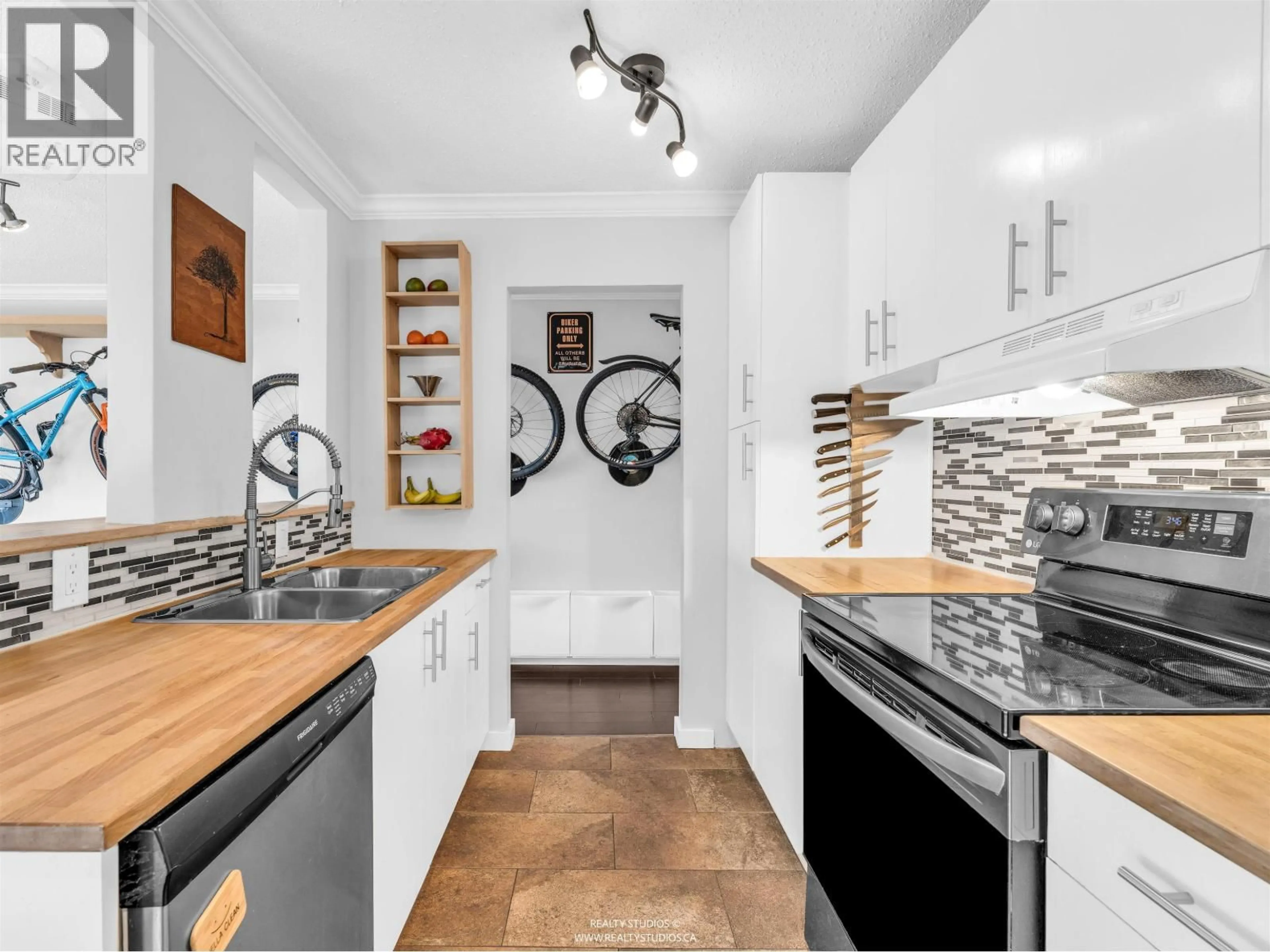 Open concept kitchen, unknown for 306 - 2222 CAMBRIDGE STREET, Vancouver British Columbia V5L1E6