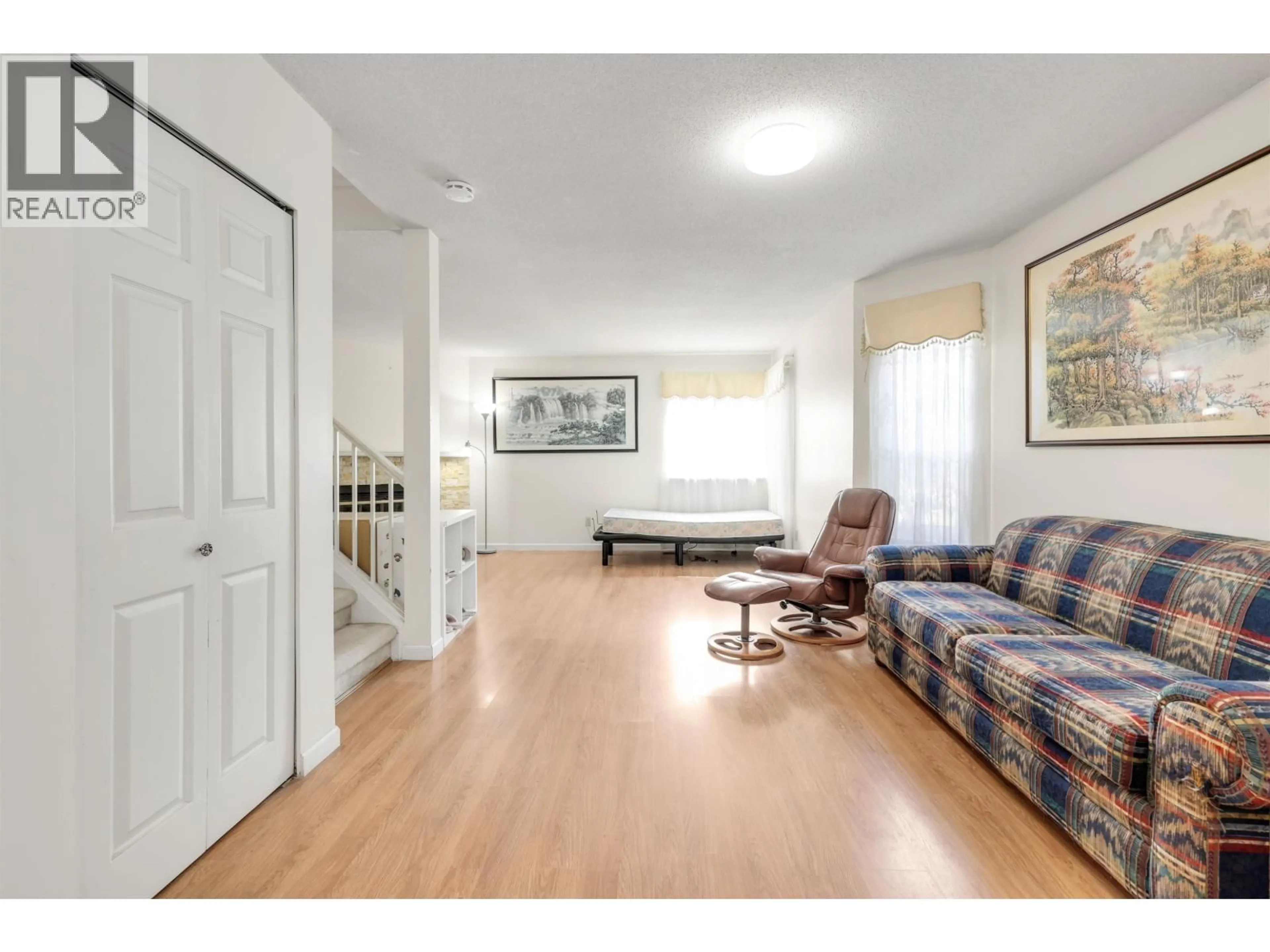 Living room with furniture, wood/laminate floor for 5 - 7240 LANGTON ROAD, Richmond British Columbia V7C4B2