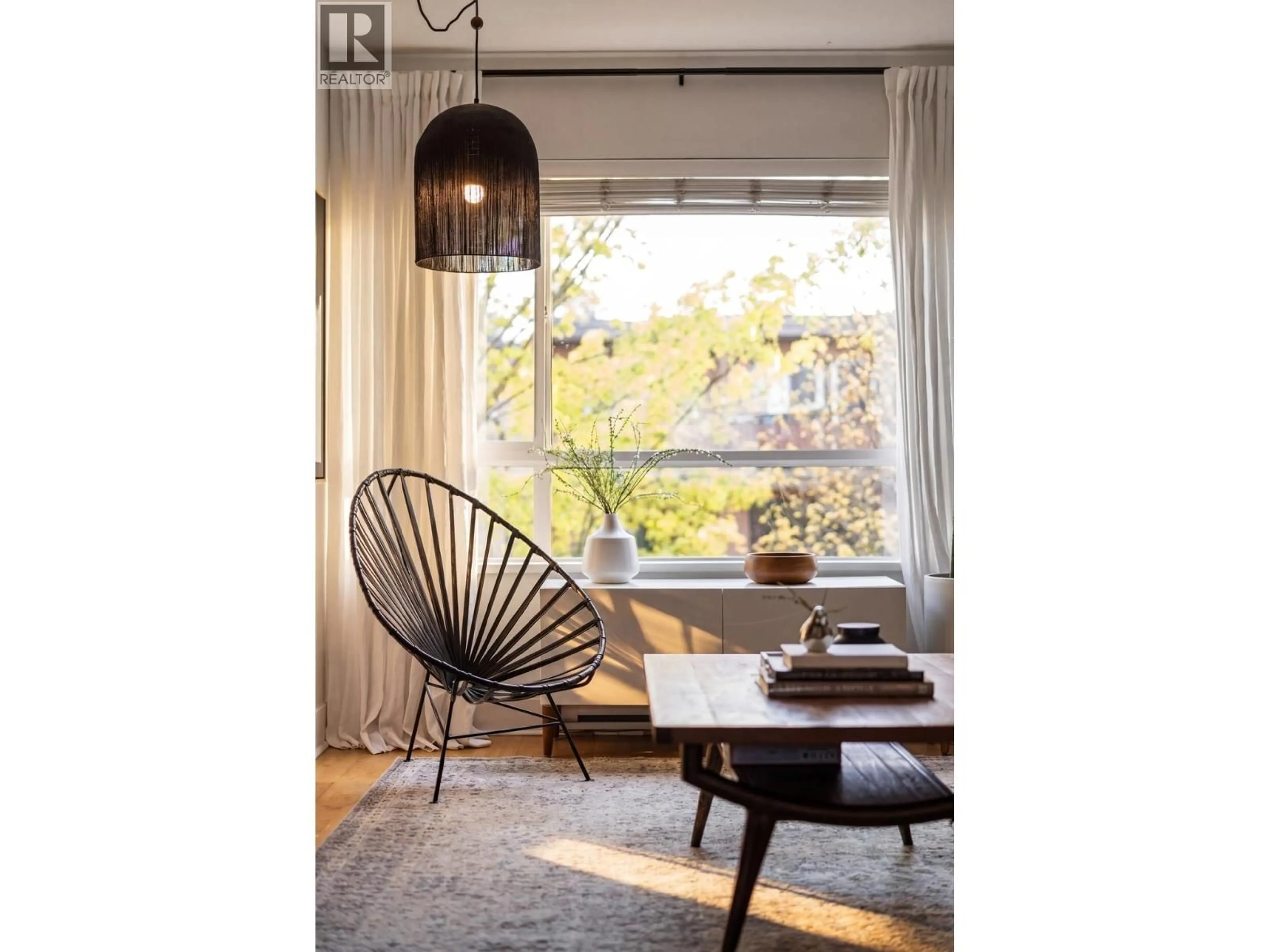 Living room with furniture, wood/laminate floor for 301 - 2688 WATSON STREET, Vancouver British Columbia V5T4T6