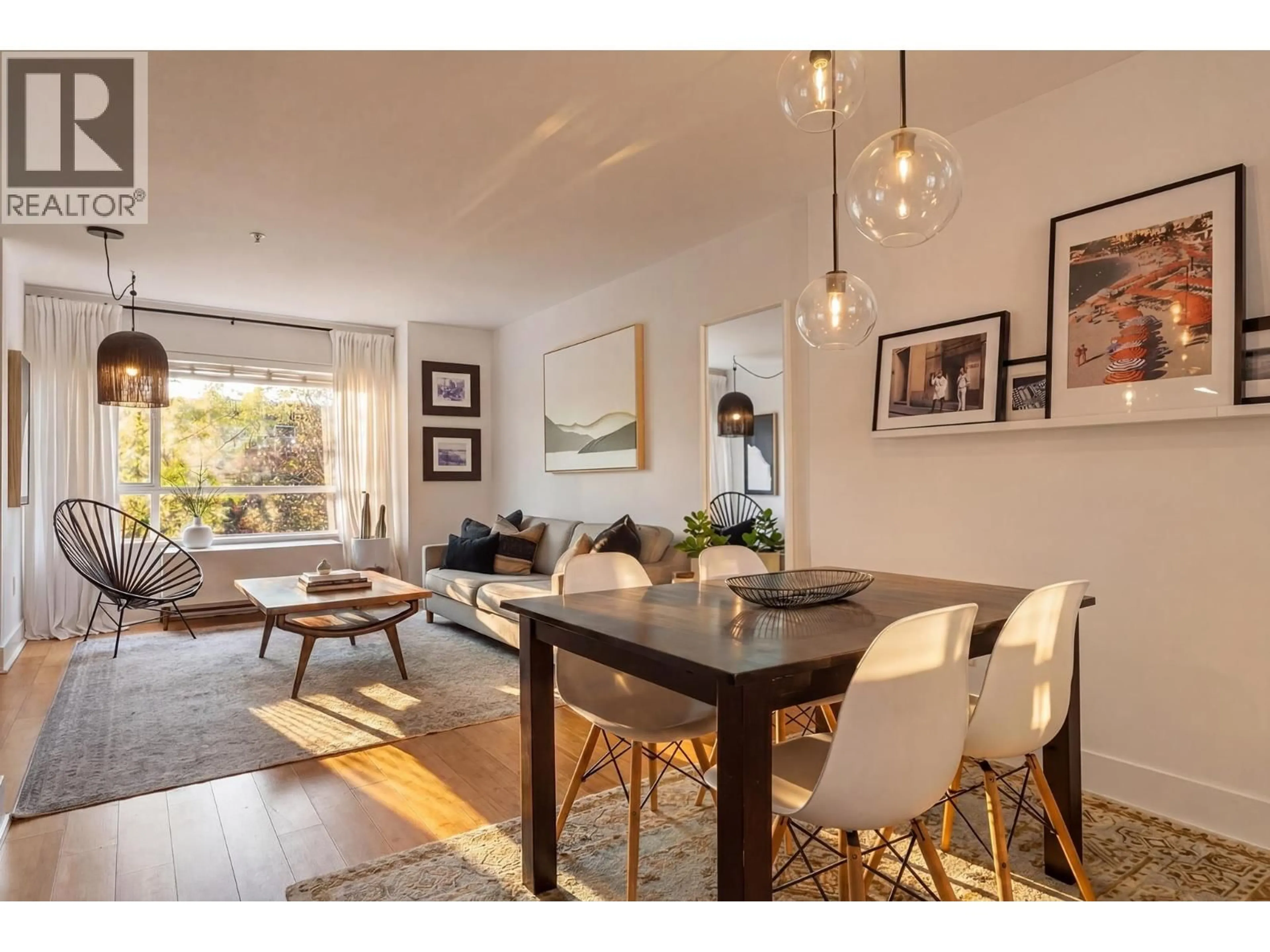 Dining room, wood/laminate floor for 301 - 2688 WATSON STREET, Vancouver British Columbia V5T4T6
