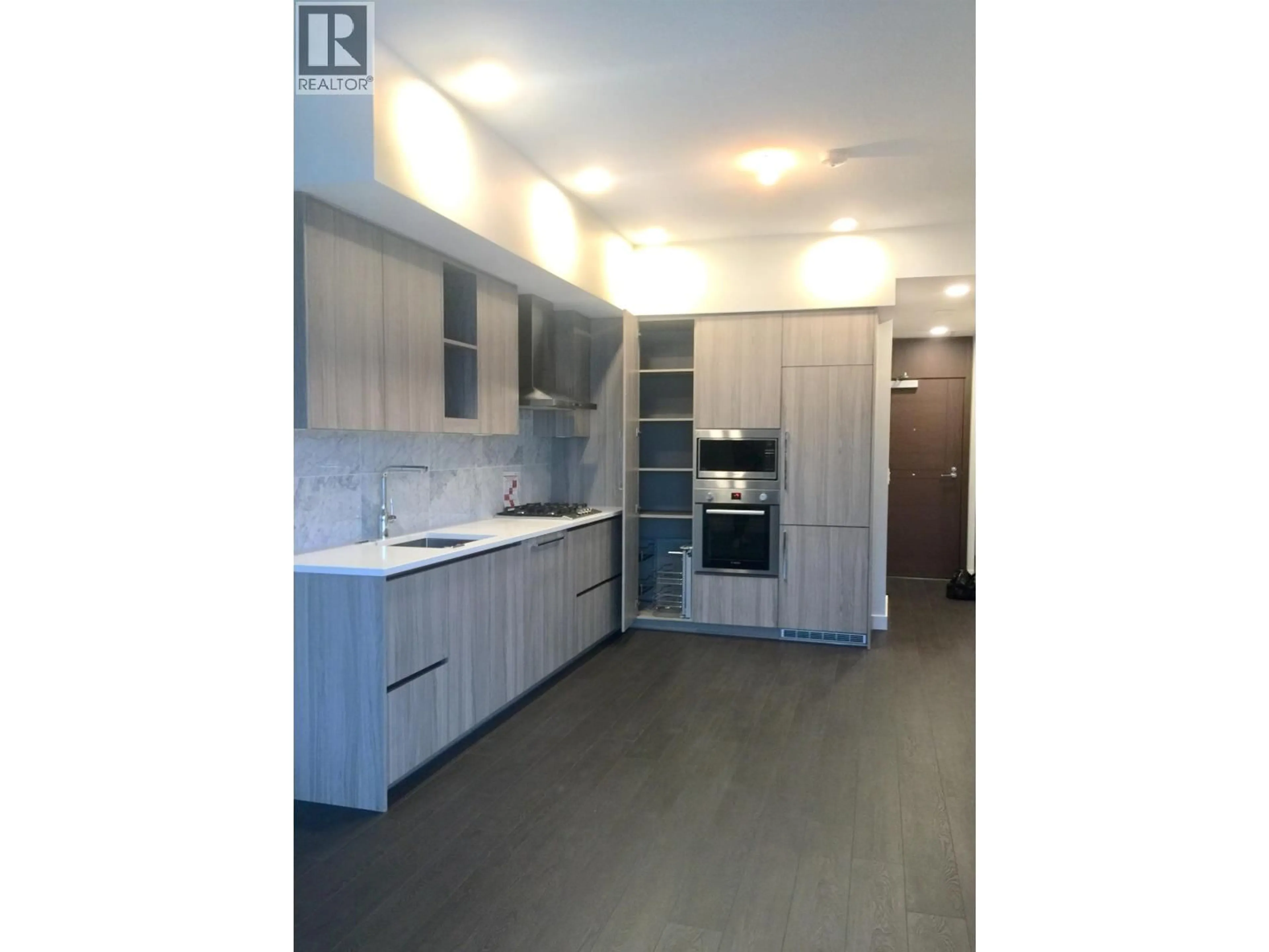 Open concept kitchen, wood/laminate floor for 1127 - 3300 KETCHESON ROAD, Richmond British Columbia V6X0S5