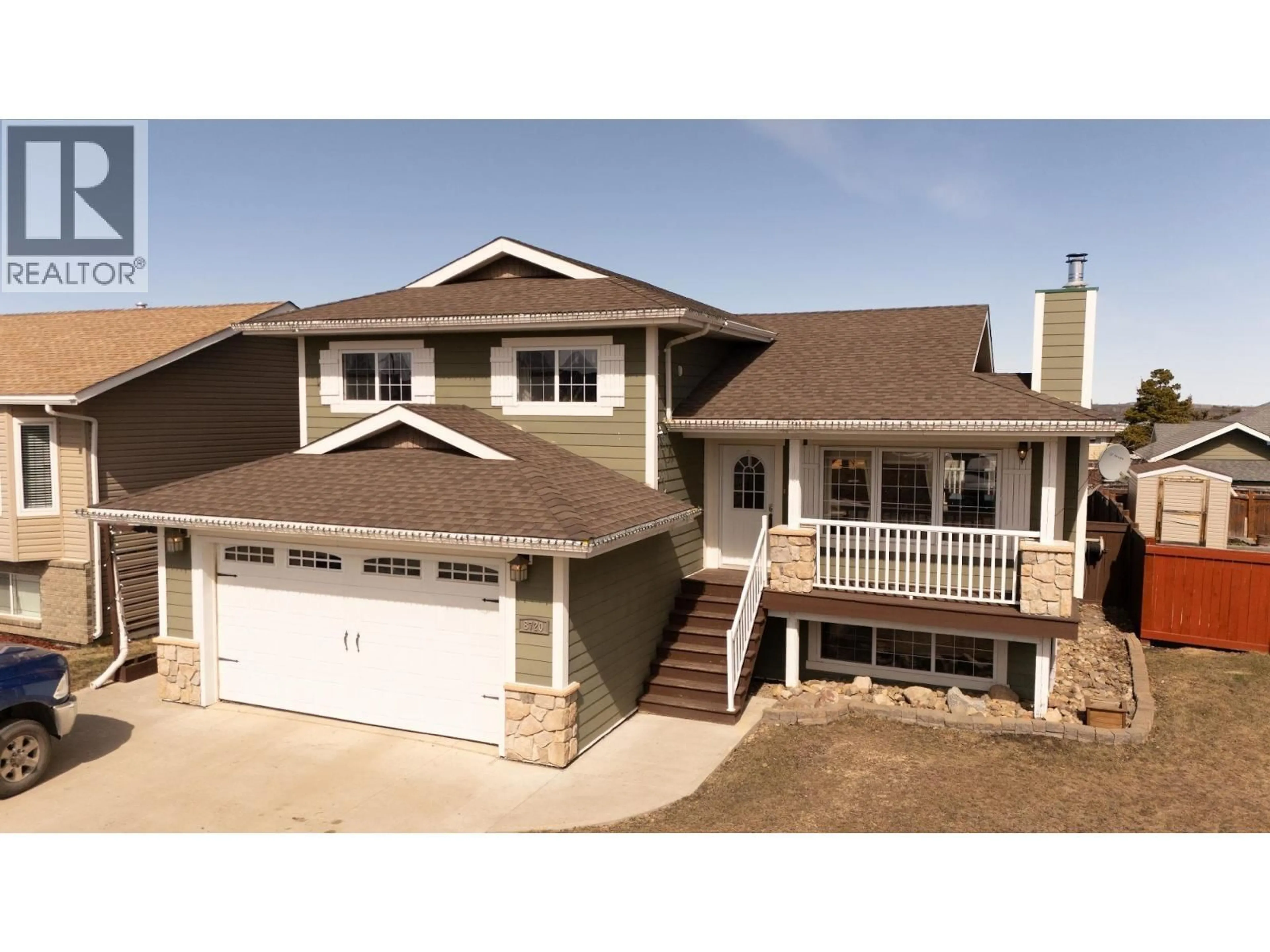 Home with vinyl exterior material, street for 8720 114 AVENUE, Fort St. John British Columbia V1J0C3