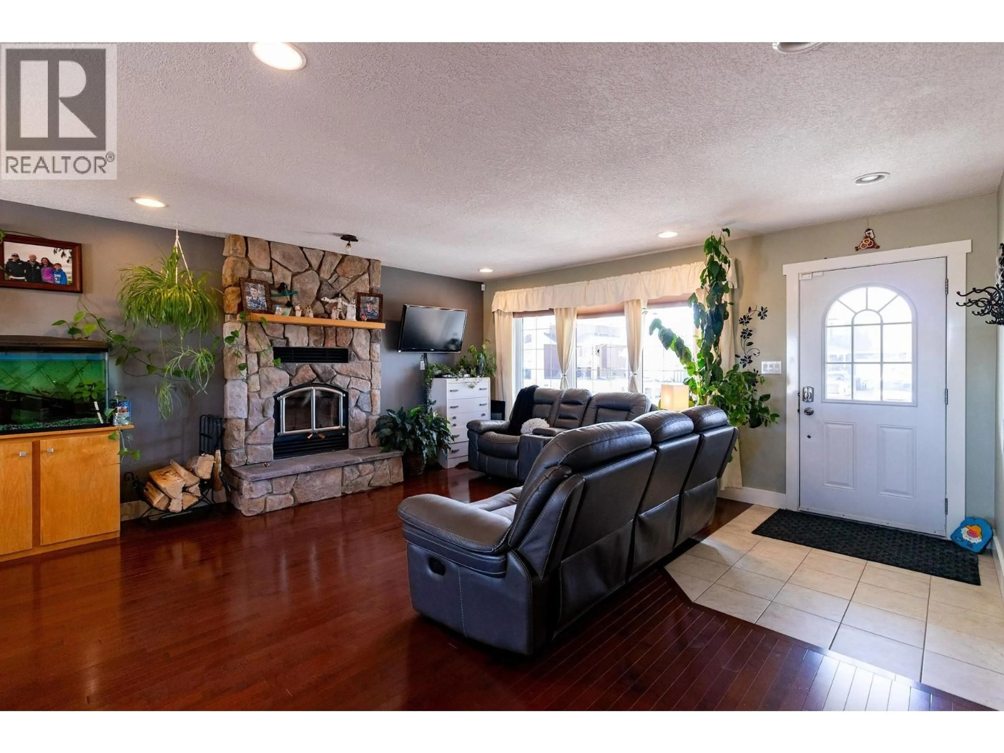 Living room with furniture, unknown for 8720 114 AVENUE, Fort St. John British Columbia V1J0C3