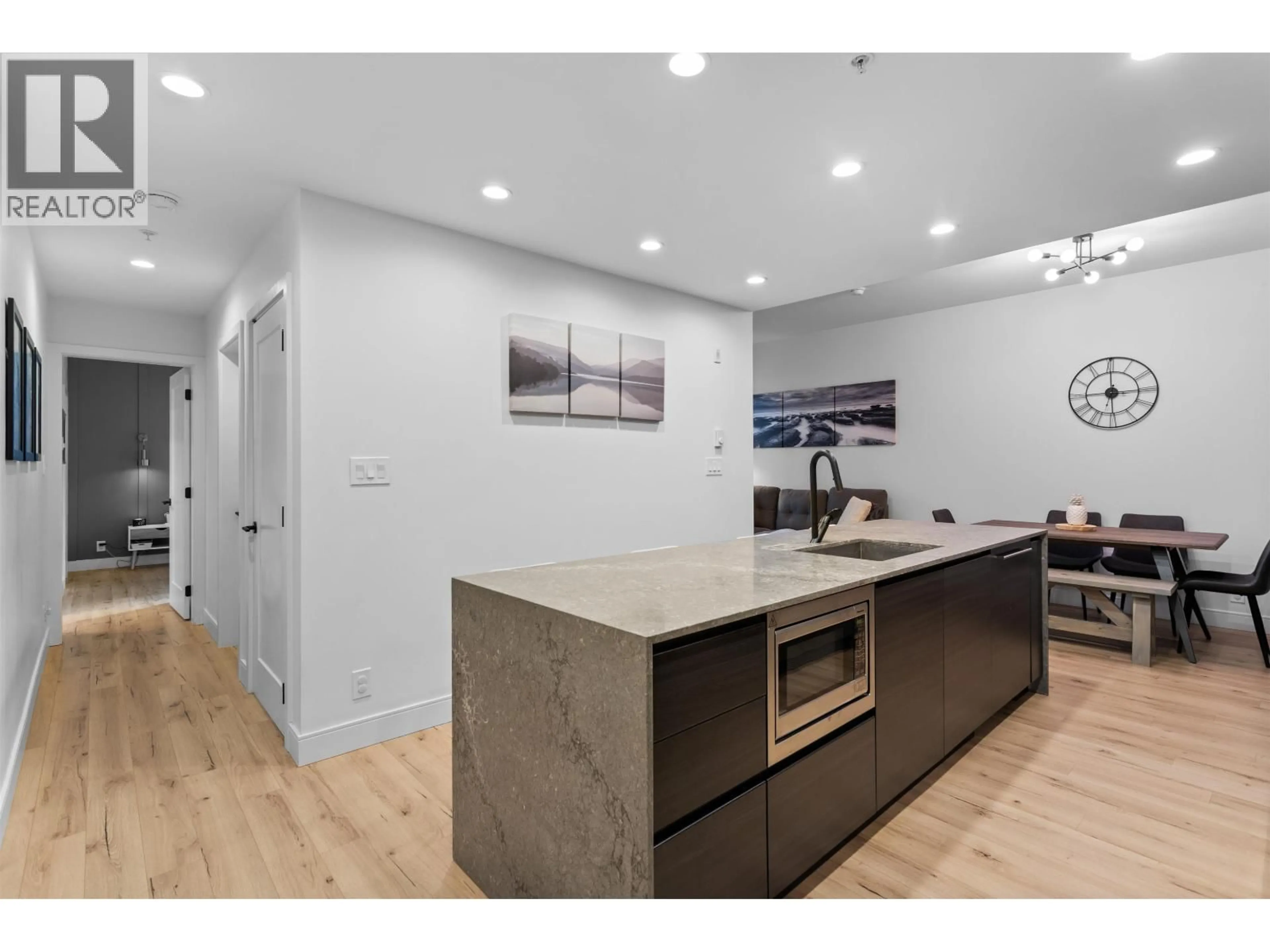 Open concept kitchen, wood/laminate floor for 108 - 55 KLAHANIE DRIVE, Port Moody British Columbia V3H2R8