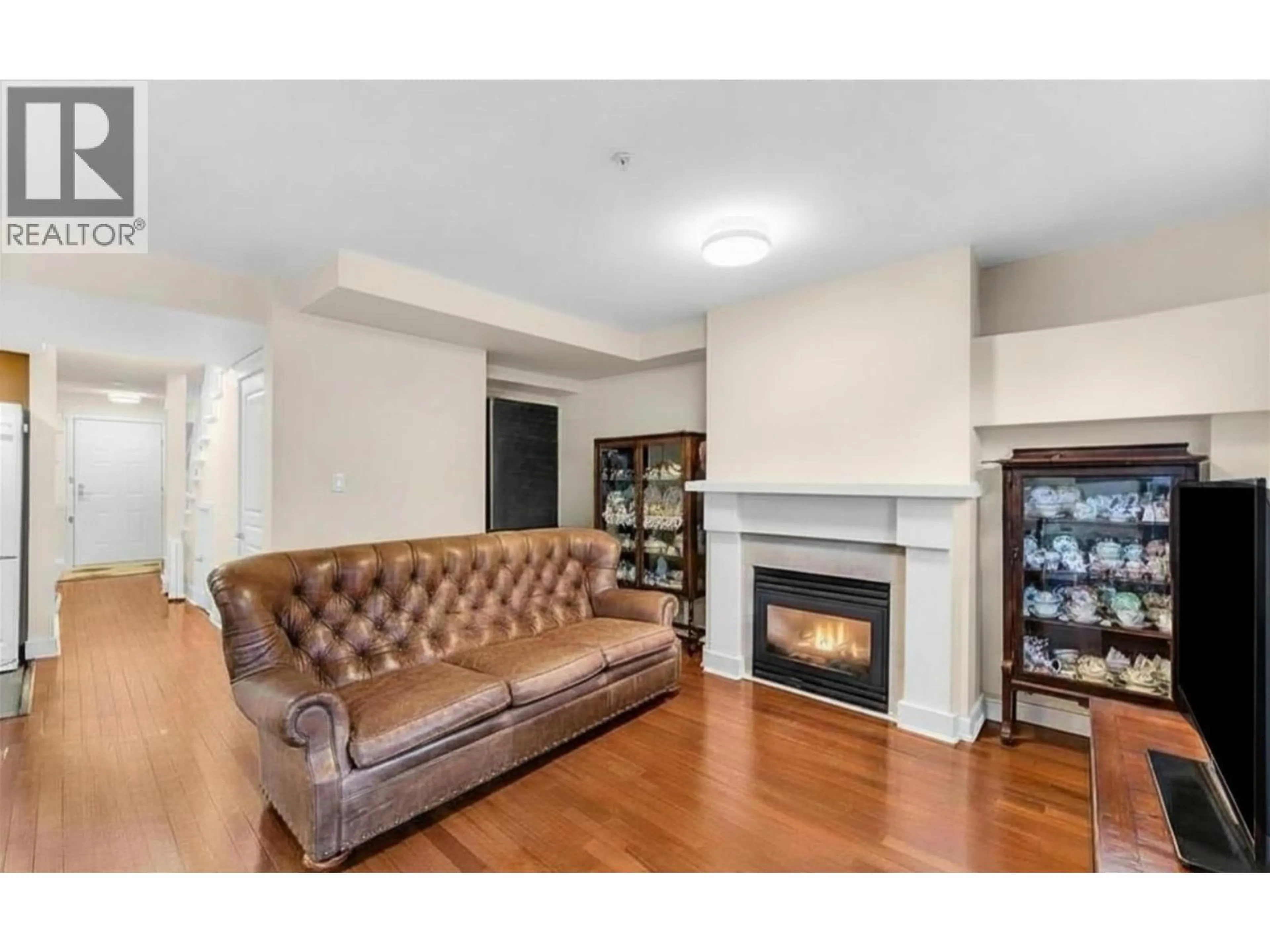 Living room with furniture, wood/laminate floor for 206 - 2071 42ND AVENUE, Vancouver British Columbia V6M2B4