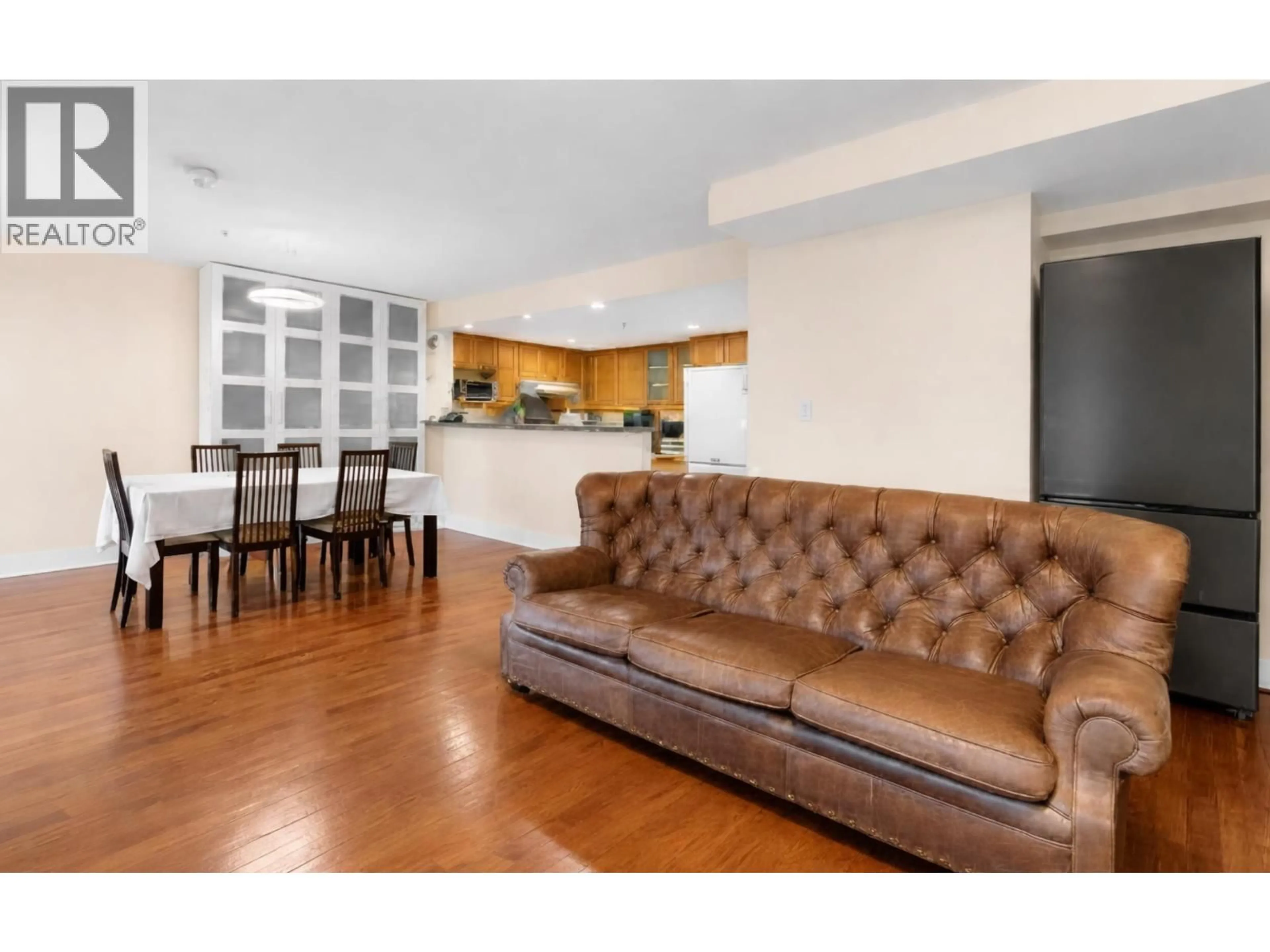 Living room with furniture, wood/laminate floor for 206 - 2071 42ND AVENUE, Vancouver British Columbia V6M2B4