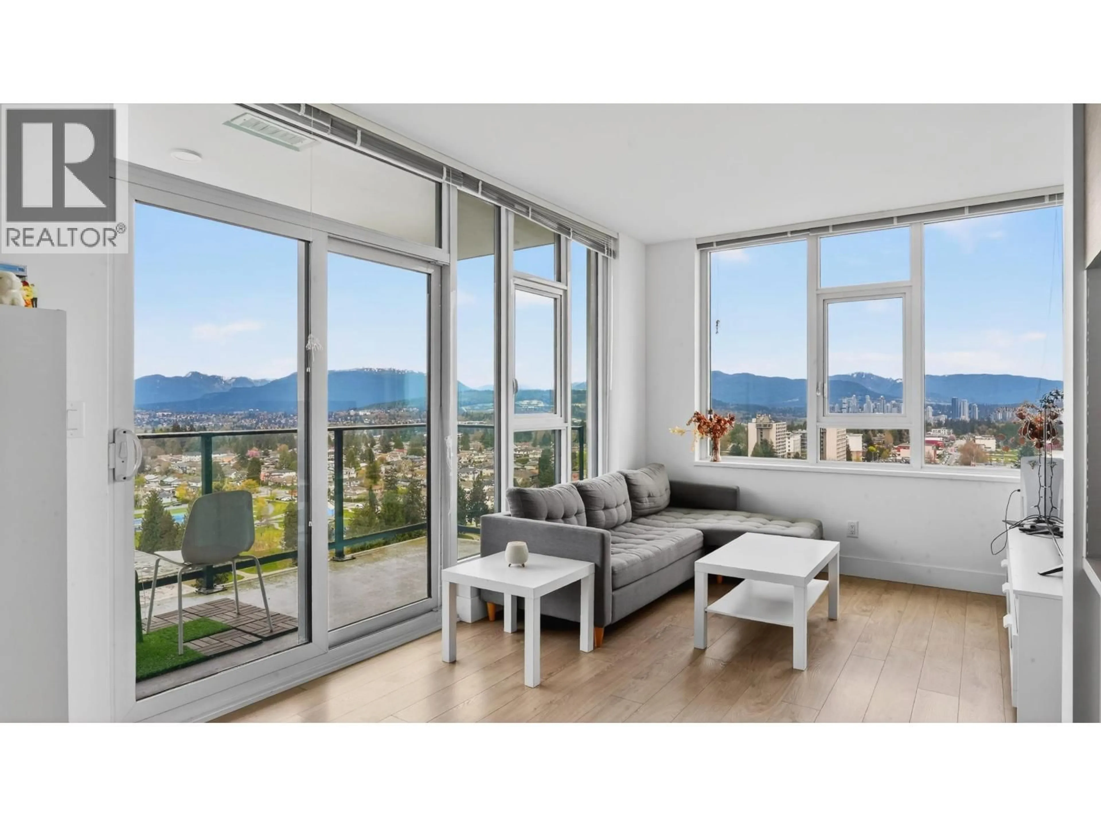 Living room with furniture, wood/laminate floor for 2205 - 7303 NOBLE LANE, Burnaby British Columbia V3N0H2