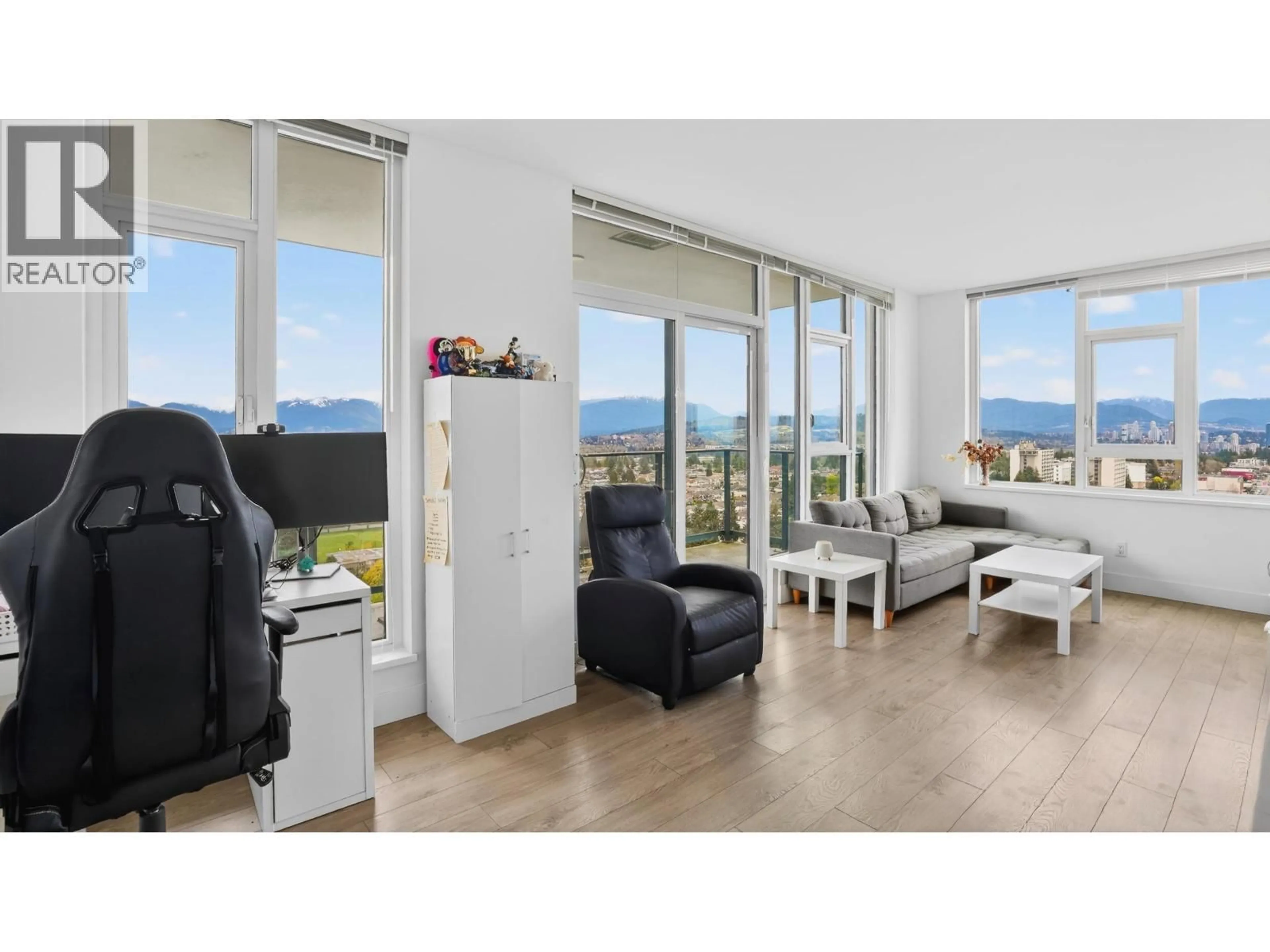 Living room with furniture, wood/laminate floor for 2205 - 7303 NOBLE LANE, Burnaby British Columbia V3N0H2