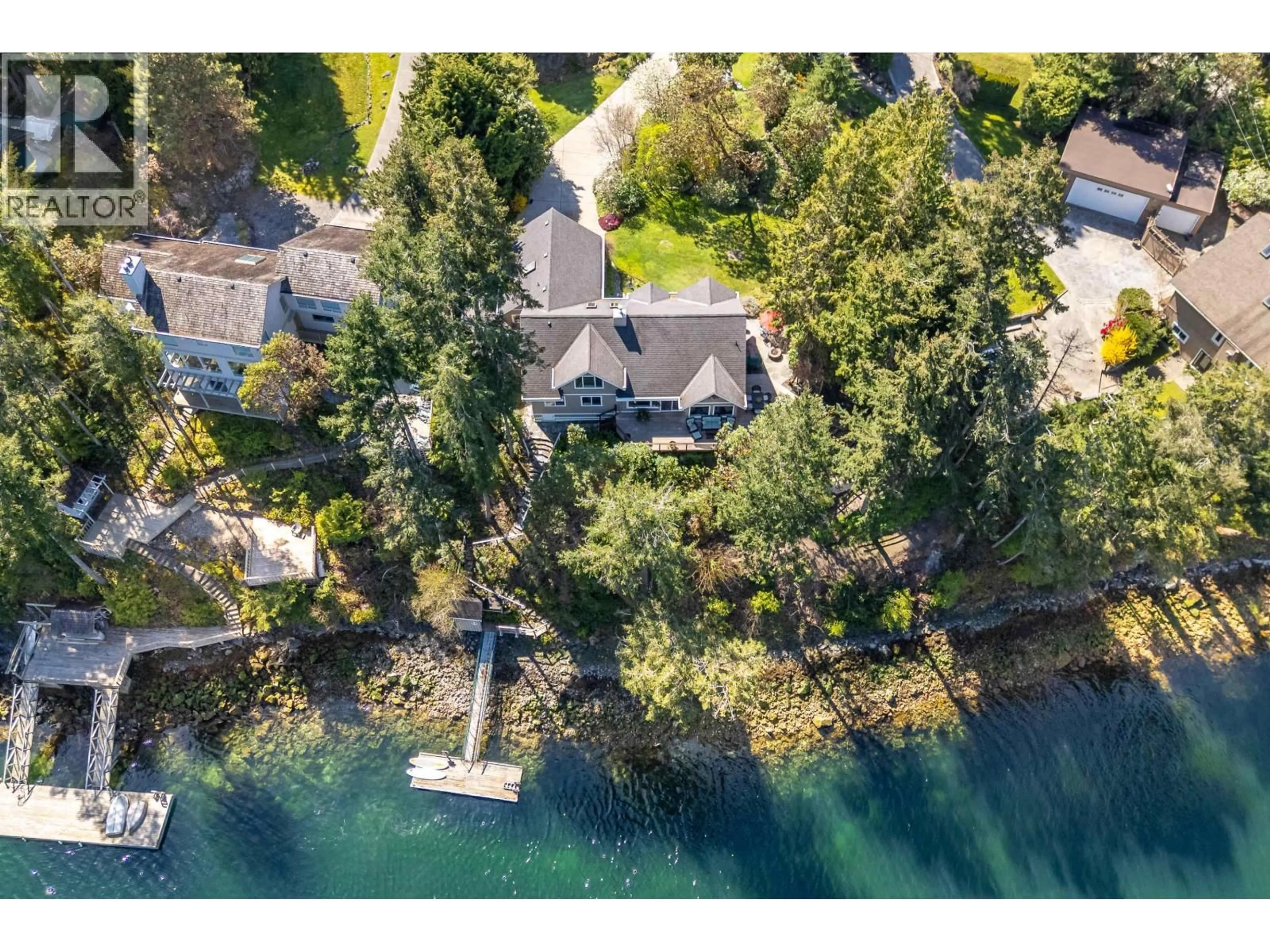 A pic from outside/outdoor area/front of a property/back of a property/a pic from drone, water/lake/river/ocean view for 10040 WESCAN ROAD, Halfmoon Bay British Columbia V0N1Y2