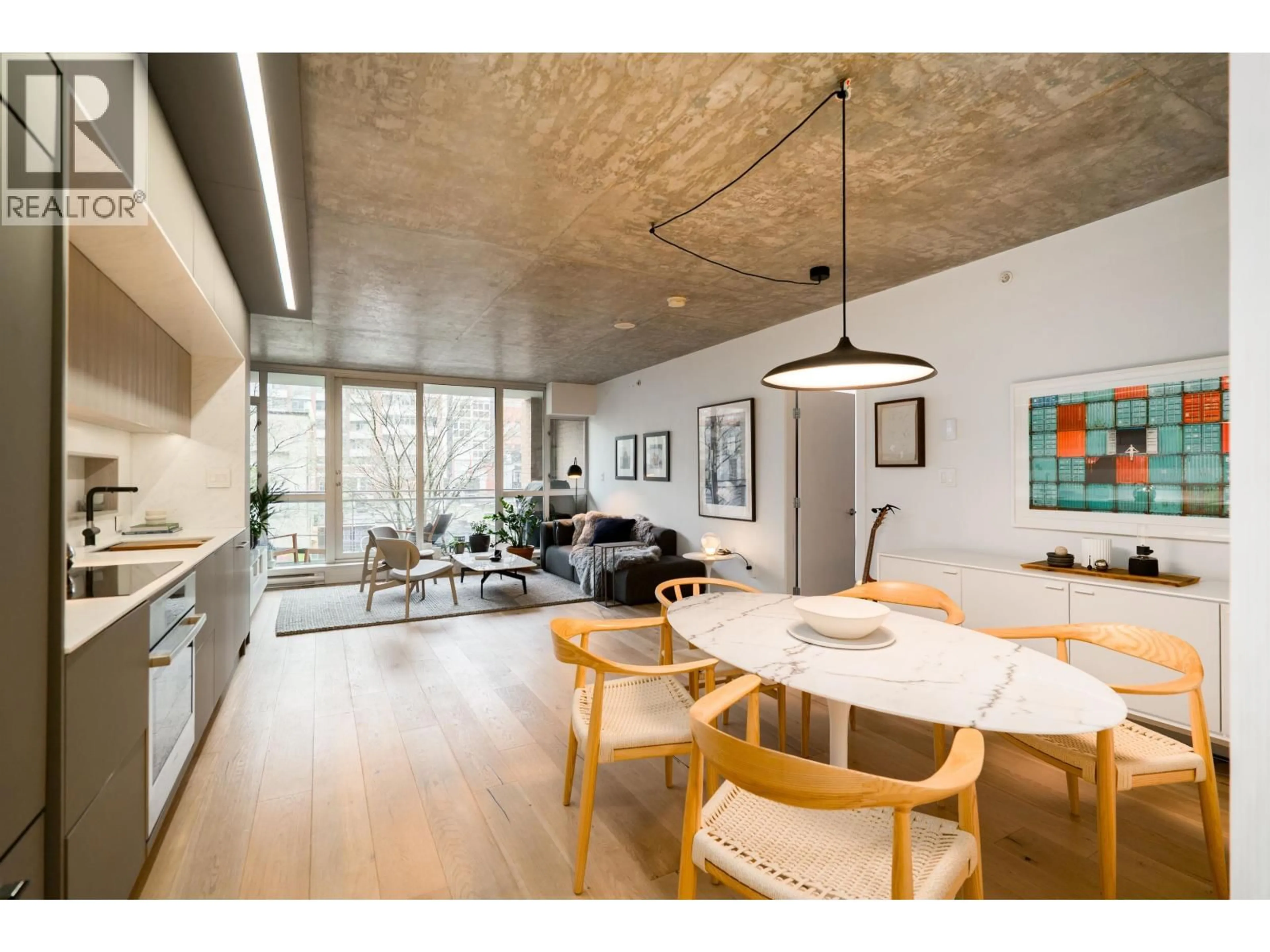 Open concept kitchen, cement floor for 314 - 221 UNION STREET, Vancouver British Columbia V6A0B4