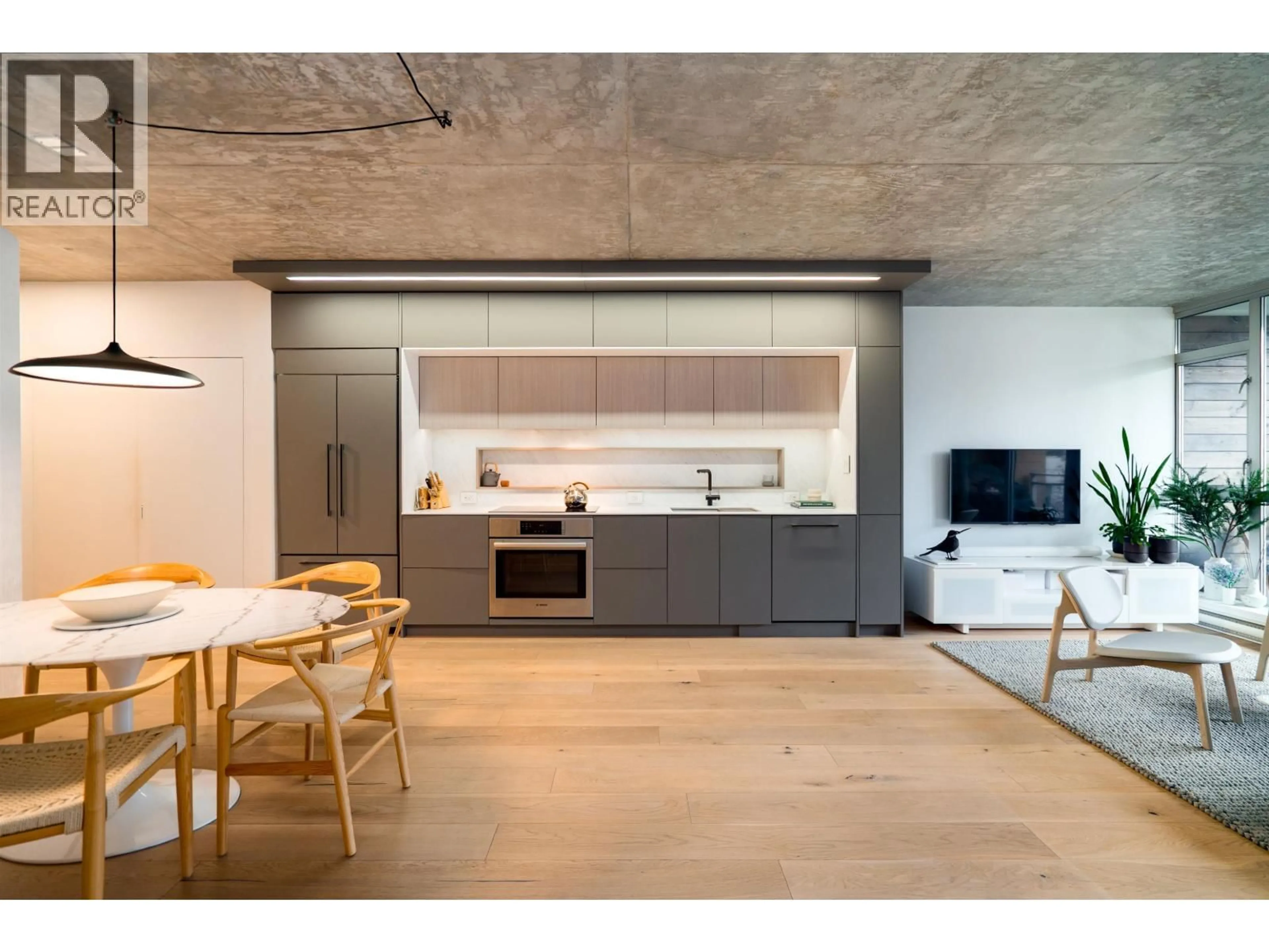 Open concept kitchen, cement floor for 314 - 221 UNION STREET, Vancouver British Columbia V6A0B4