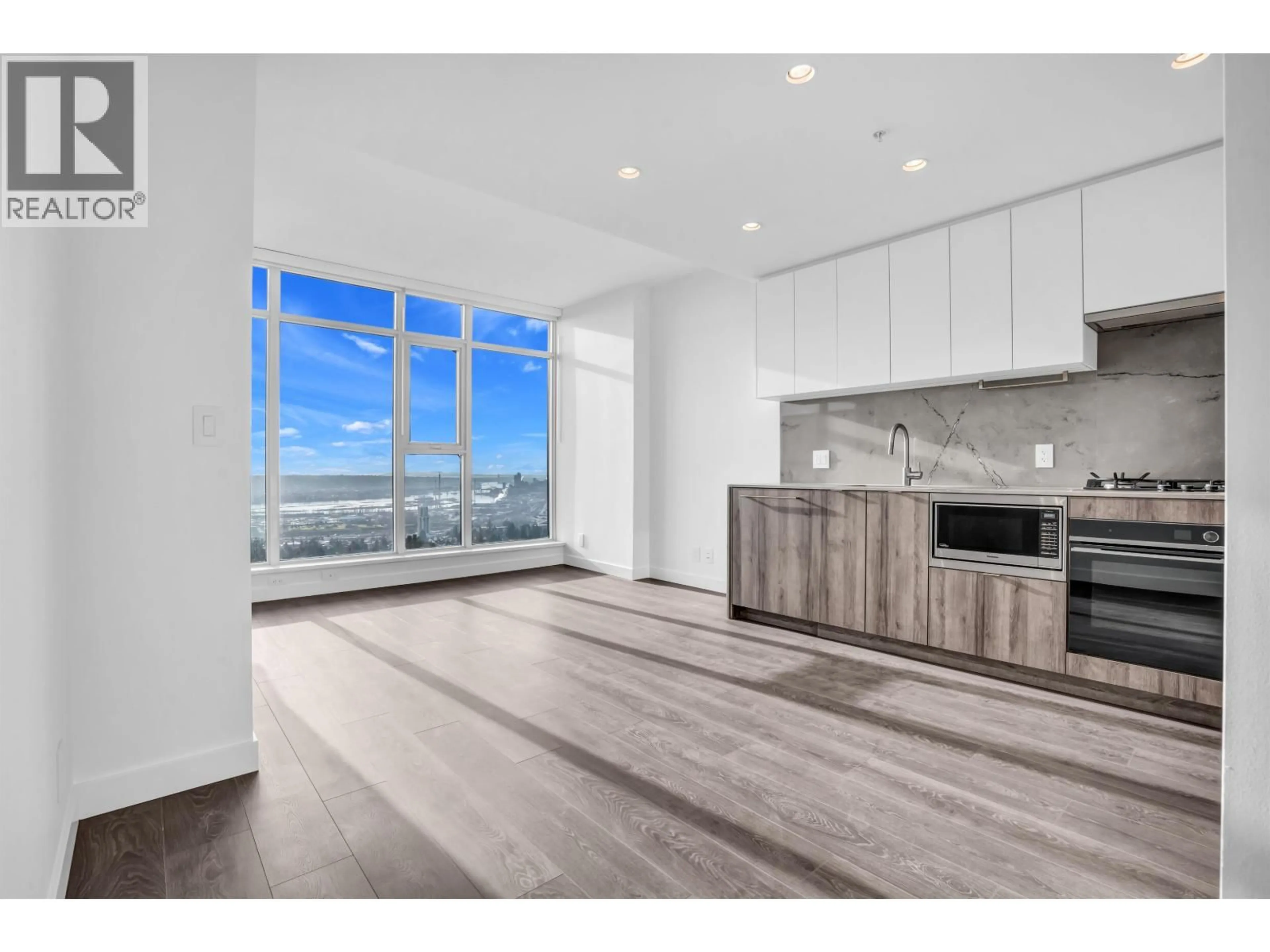 Open concept kitchen, wood/laminate floor for 1603 - 505 NELSON STREET, Coquitlam British Columbia V3J0R5