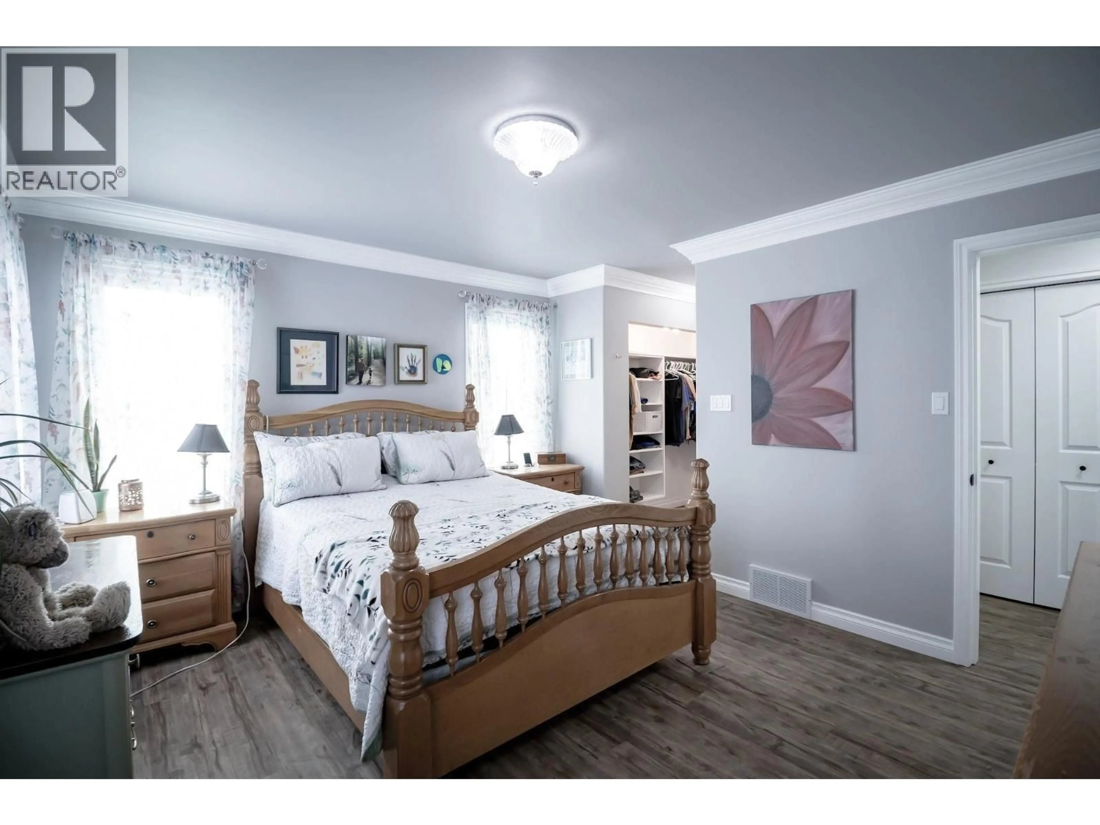 Bedroom with bed, wood/laminate floor for 12903 AGNES LANE, Charlie Lake British Columbia V0C1H0