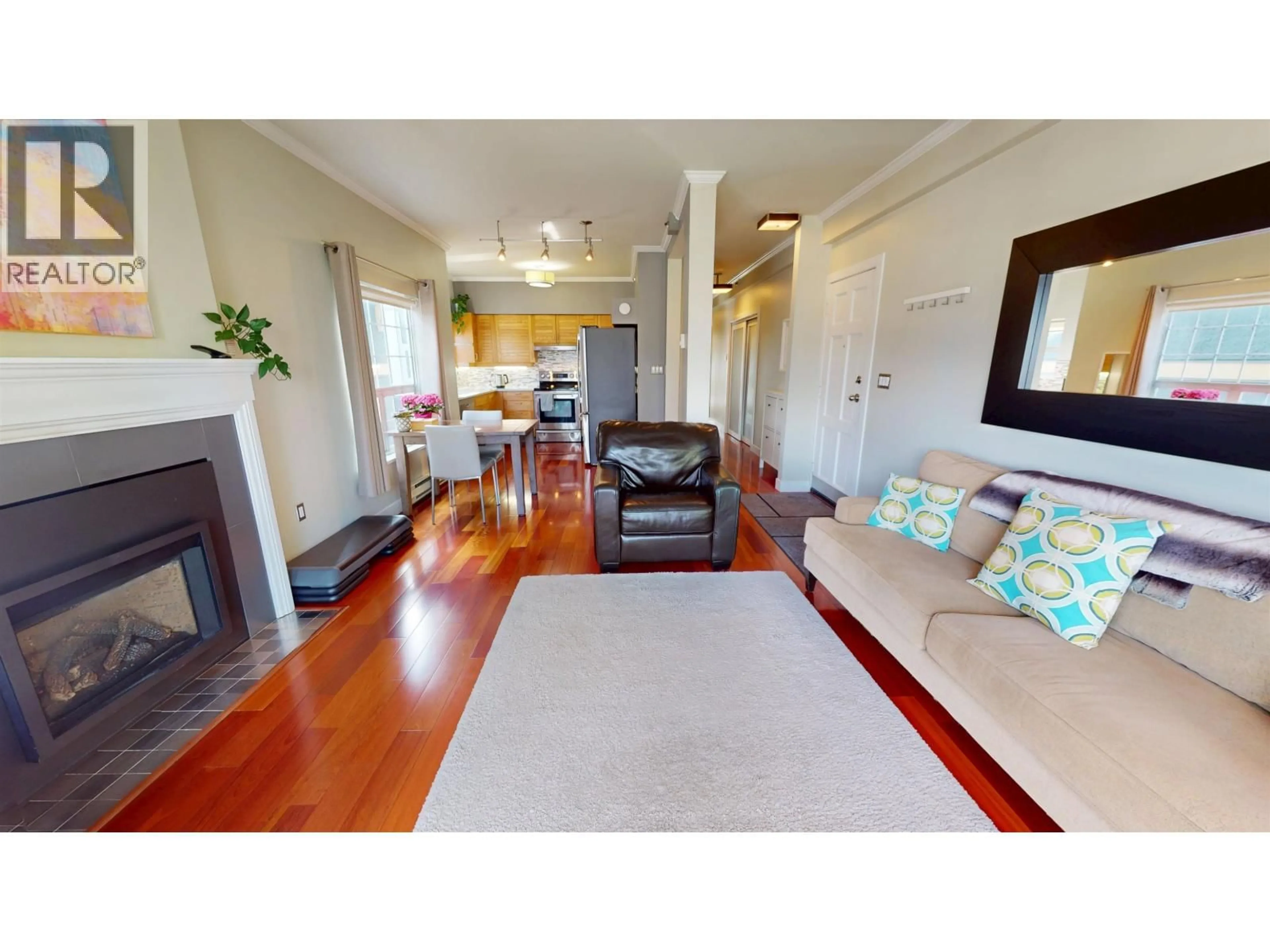 Living room with furniture, wood/laminate floor for 2158 3RD AVENUE, Vancouver British Columbia V6K1L1