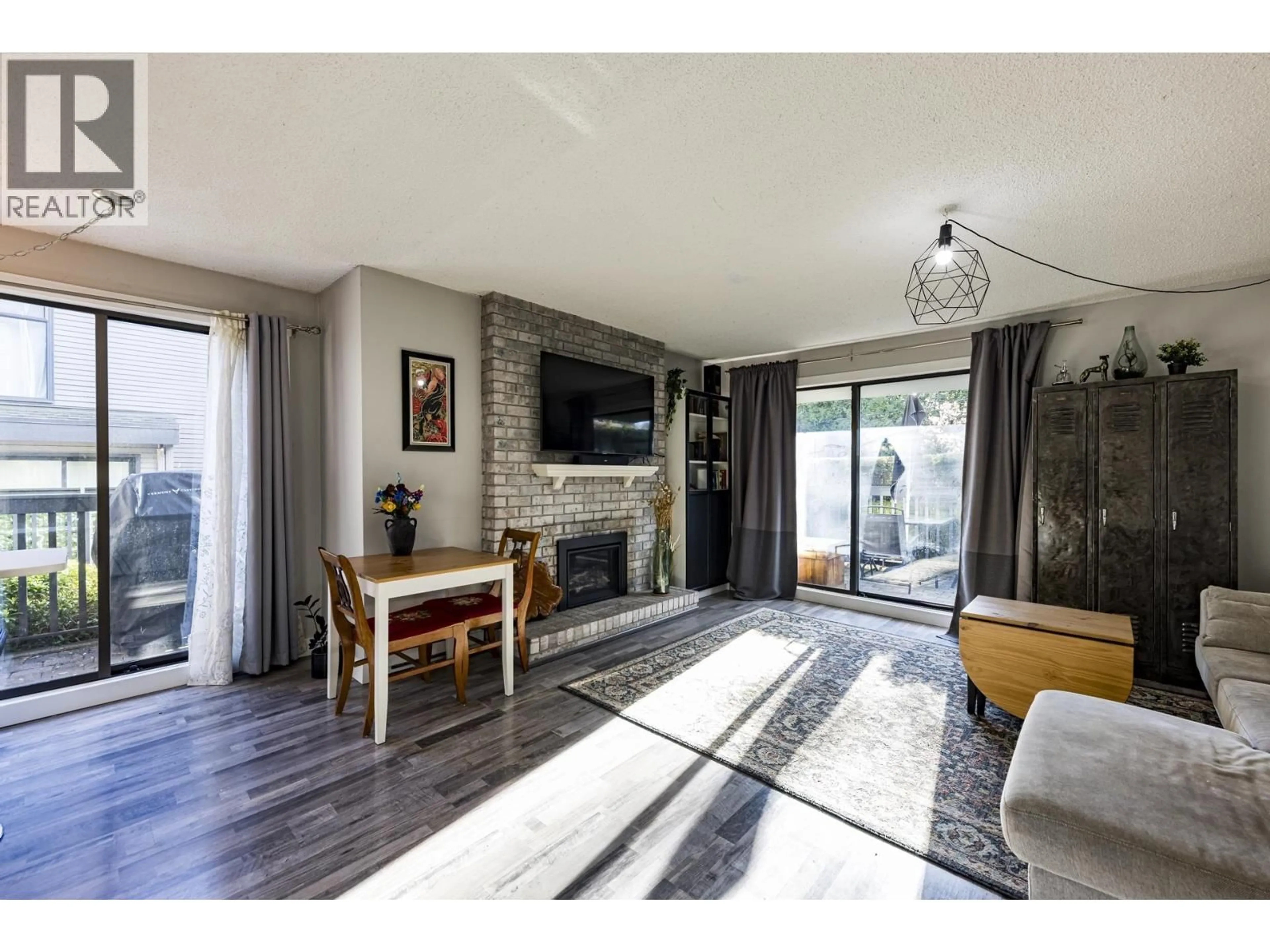 Living room with furniture, wood/laminate floor for 3132 LONSDALE AVENUE, North Vancouver British Columbia V7N3J8