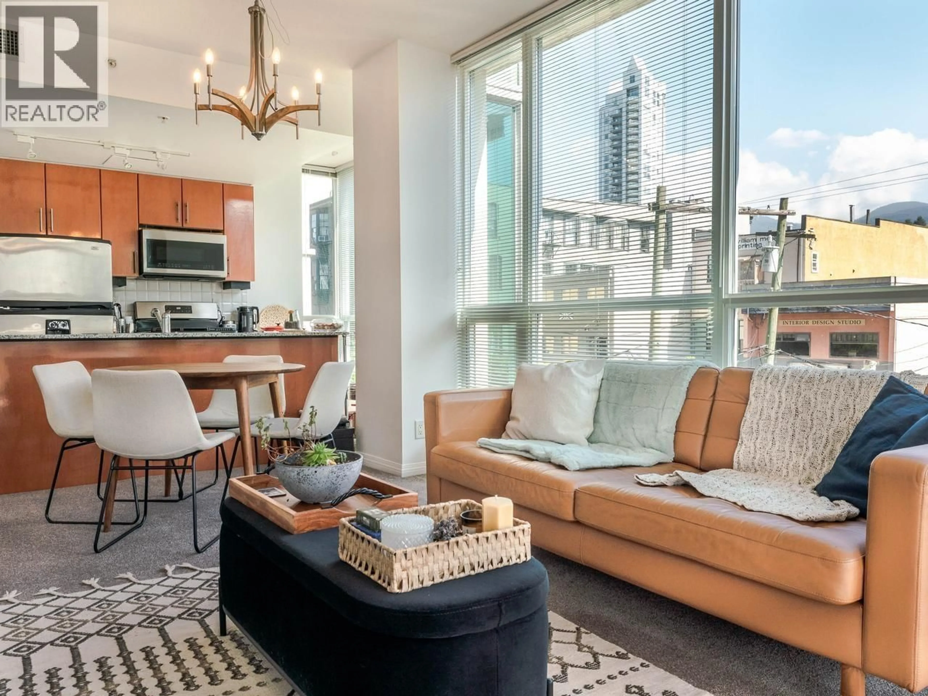 Living room with furniture, unknown for 401 - 138 ESPLANADE, North Vancouver British Columbia V7L4X9