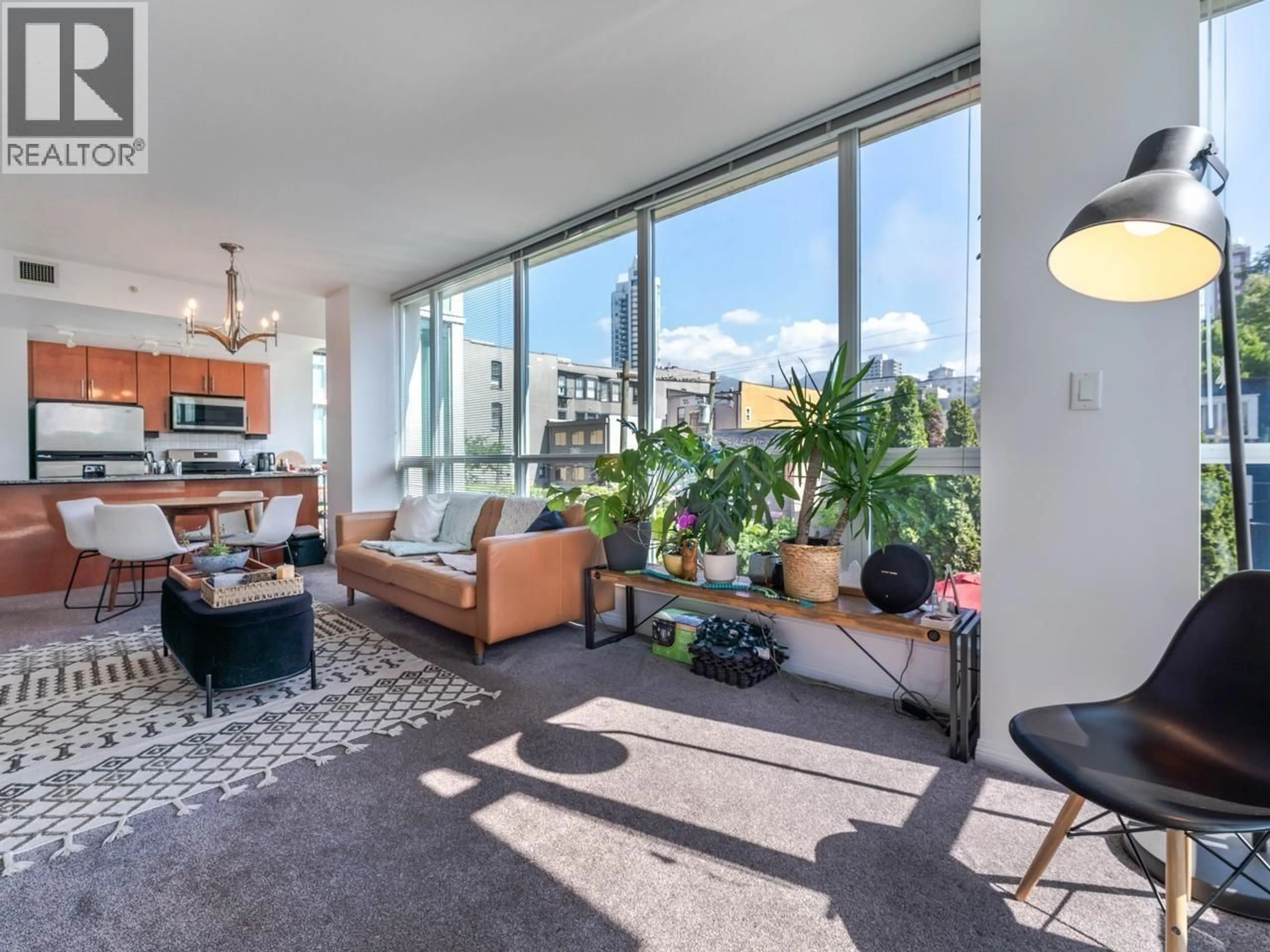 Living room with furniture, unknown for 401 - 138 ESPLANADE, North Vancouver British Columbia V7L4X9