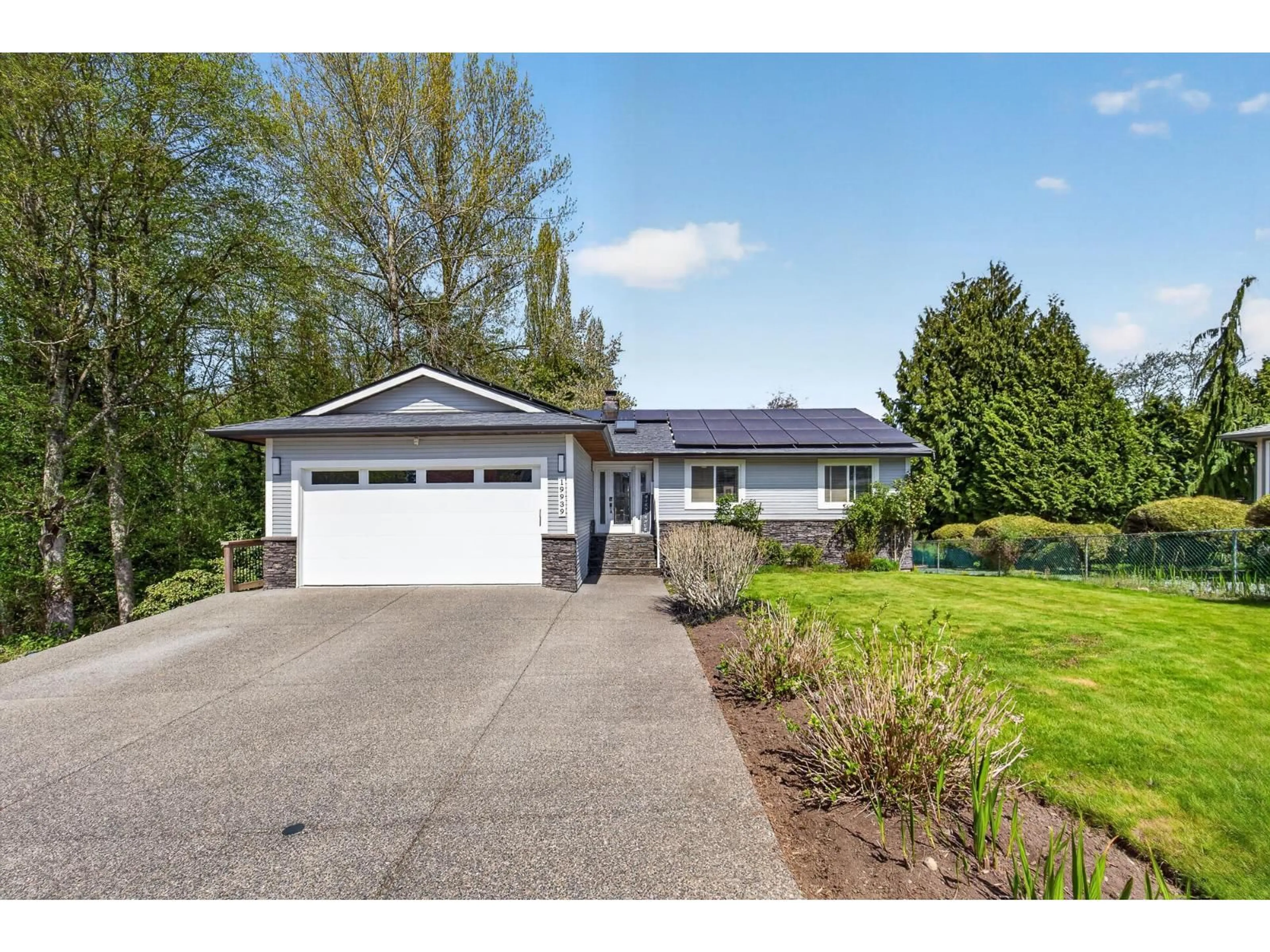 Home with vinyl exterior material, street for 19939 51 AVENUE, Langley British Columbia V3A7P2