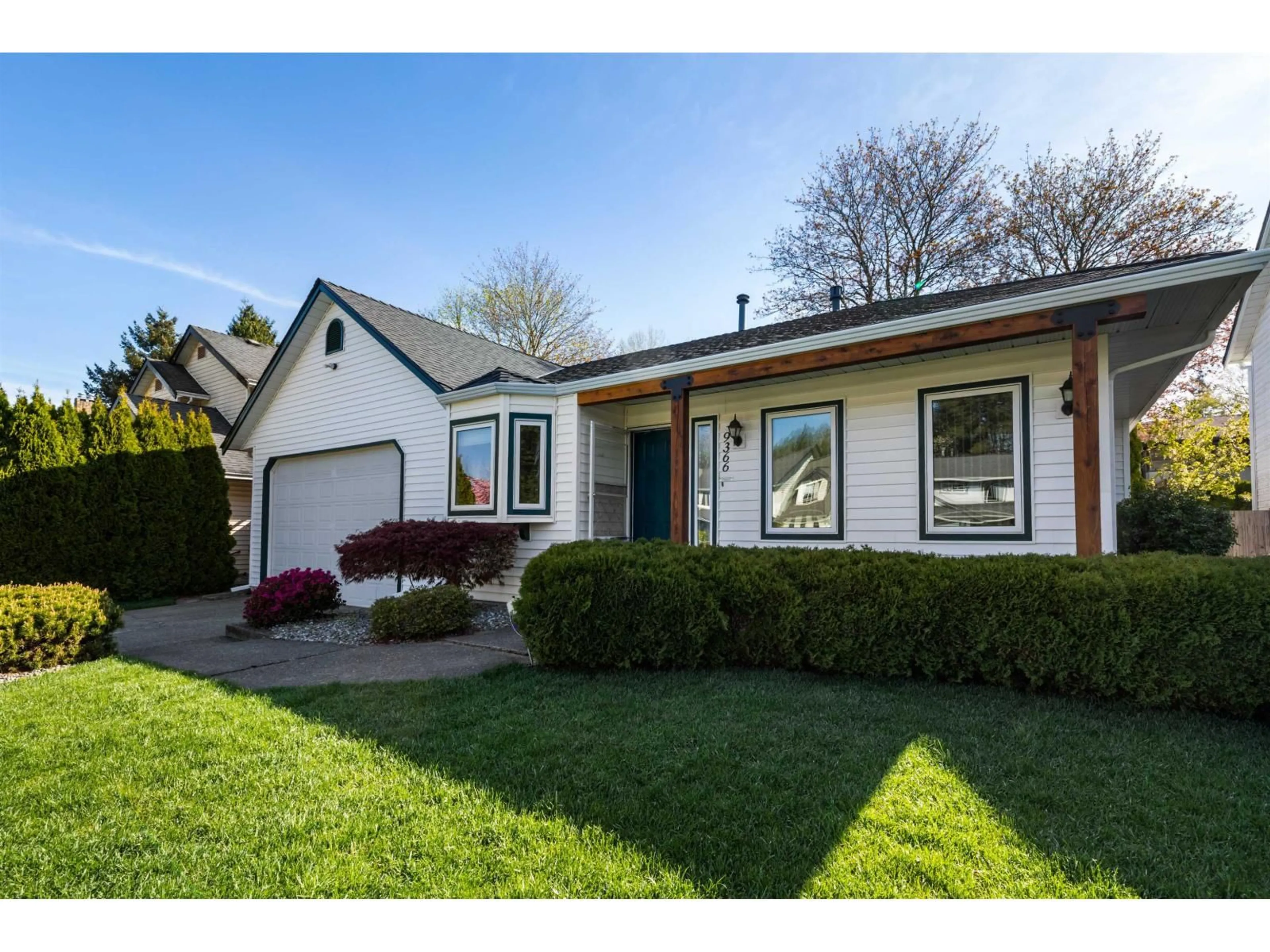 Home with vinyl exterior material, street for 9366 209B STREET, Langley British Columbia V1M1R8